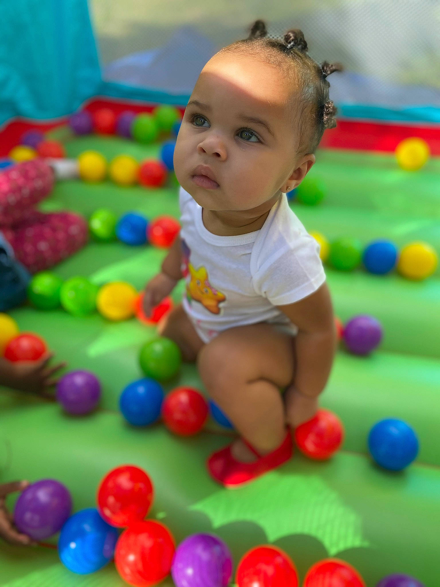Irie joined the competition — help win amazing prizes! baby, baby_playing_with_toys, ball, ball_pit, child, fun, games, leisure, person, play, product, smile, toddler, toy