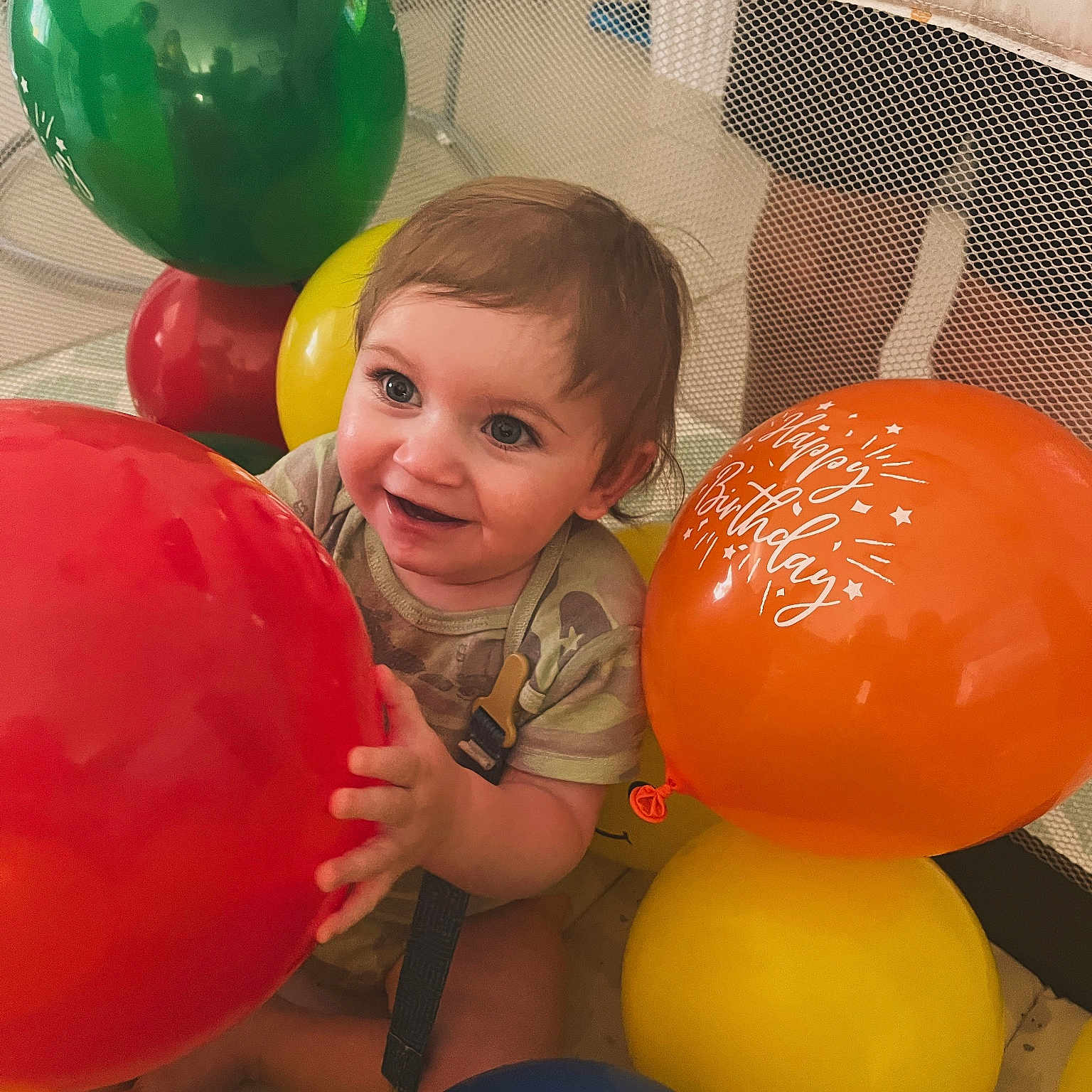 Tucker is registered to the contest to win money with this photo: architecture, baby, balloon, bodypart, building, face, finger, happy, head, indoors, inflatable, outdoors, people, person, photography, playarea, portrait, shelter, smile, sphere