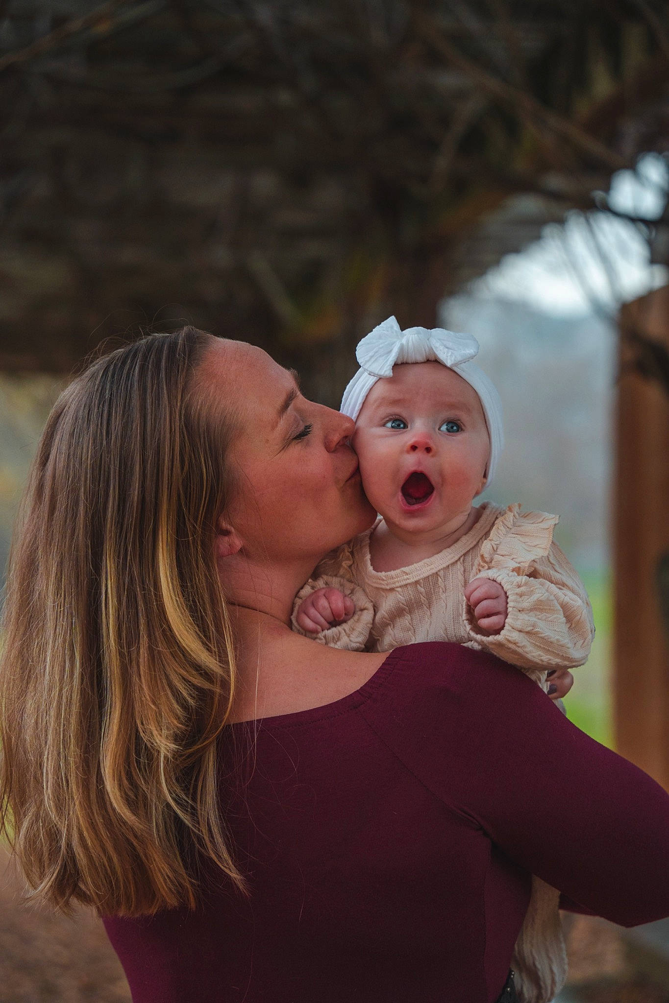 Kay is registered to the contest to win money with this photo: baby, cheek, event, flash_photography, fun, fur, gesture, grass, happy, headwear, hug, jewellery, kiss, laugh, lip, people_in_nature, person, portrait_photography, romance, smile