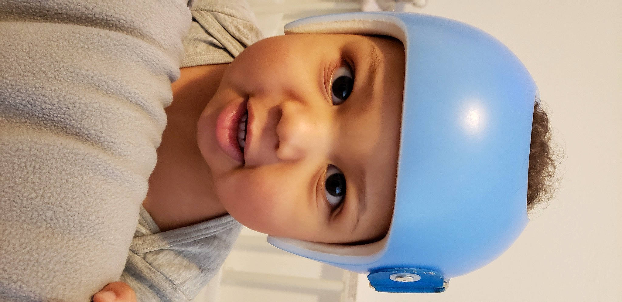 Lj is registered to the contest to win money with this photo: baby, beauty, cheek, child, close_up, electric_blue, eyebrow, eyelash, flash_photography, forehead, fun, happy, headwear, iris, jaw, lip, mouth, nose, person, skin