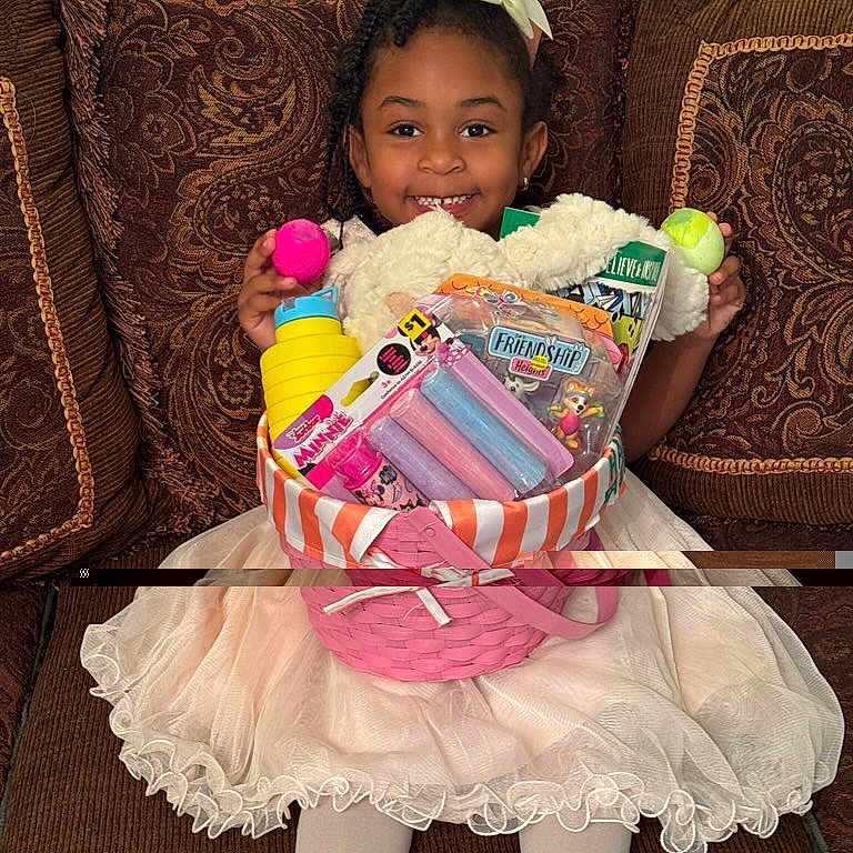 Royce'Lynn is registered to the contest to win money with this photo: basket, child, couch, cushion, face, female, food, furniture, girl, head, homedecor, people, person, photography, portrait, racket, sport, sweets, tennis, tennisracket