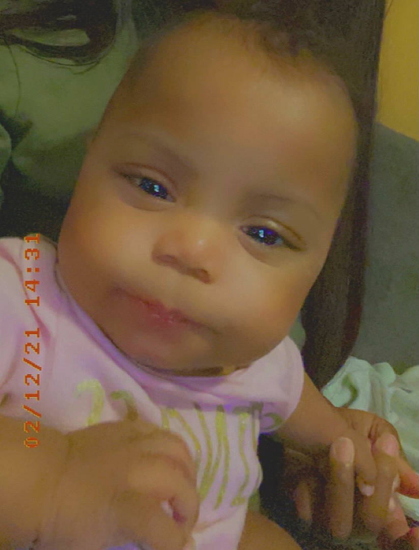 Jayda is registered to the contest to win money with this photo: baby_toddler_clothing, cheek, chin, ear, eye, eyebrow, eyelash, face, facial_expression, finger, forehead, hairstyle, hand, head, iris, lip, mouth, neck, nose, person