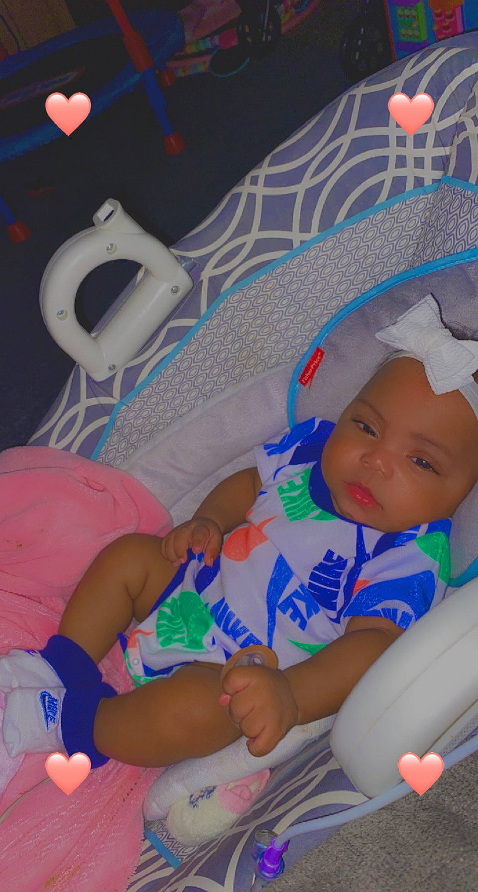 Jayda is registered to the contest to win money with this photo: baby, baby_products, baby_toddler_clothing, carmine, child, comfort, elbow, fun, happy, hat, headwear, human_leg, knee, lap, linens, pattern, person, smile, thigh, toddler