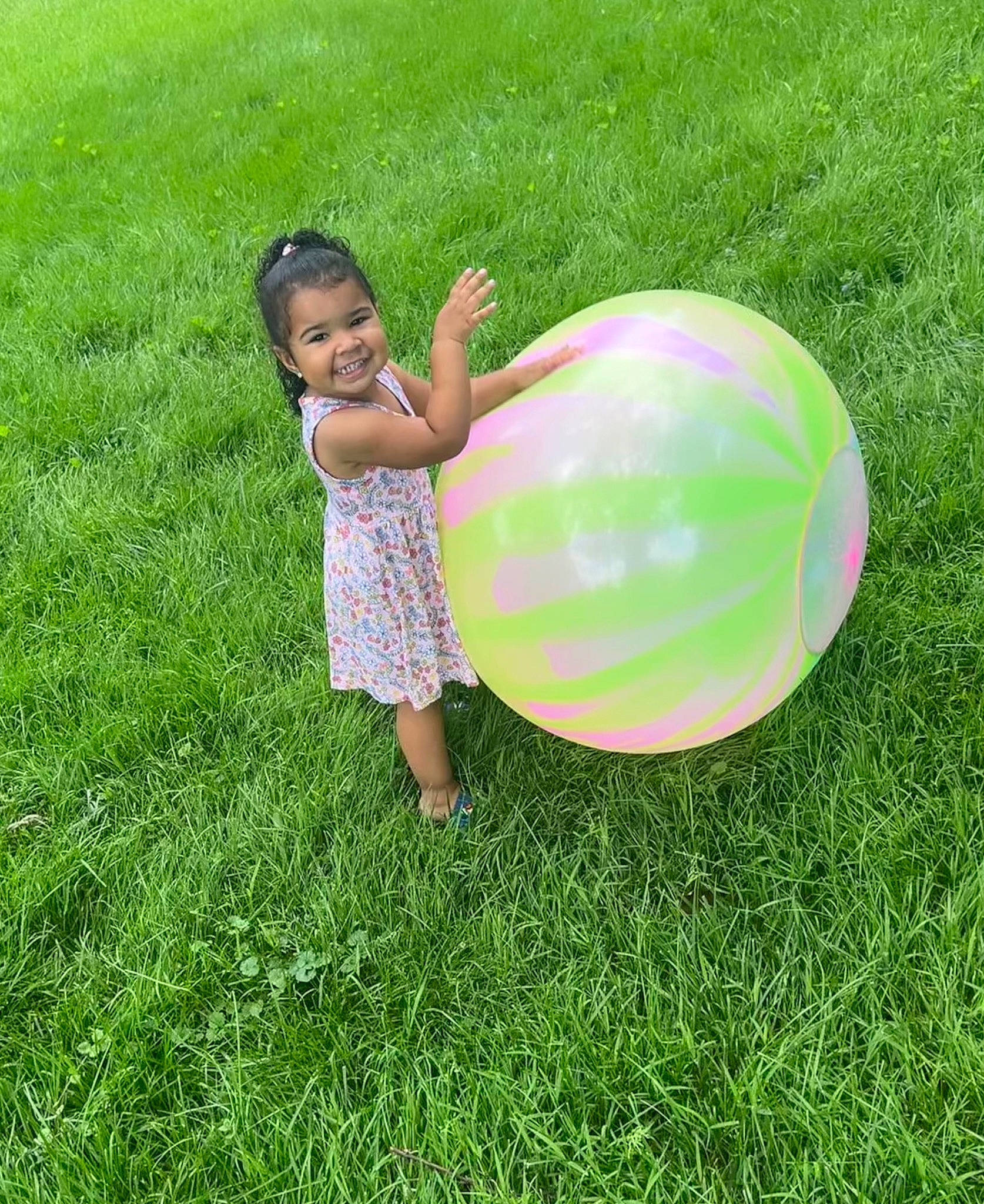 Leilanni joined the competition — help win amazing prizes! baby_toddler_clothing, balloon, botany, child, fun, grass, grassland, groundcover, happy, joy, lawn, leisure, magenta, meadow, party_supply, people_in_nature, person, plant, play, recreation