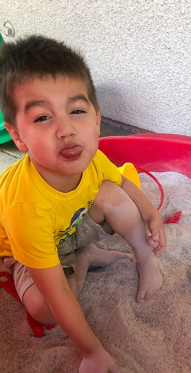 Joshua Jr. is registered to the contest to win money with this photo: baby_toddler_clothing, barefoot, cheek, child, chin, finger, flooring, foot, fun, happy, human_body, human_leg, leg, leisure, mouth, nose, person, skin, thigh, thumb