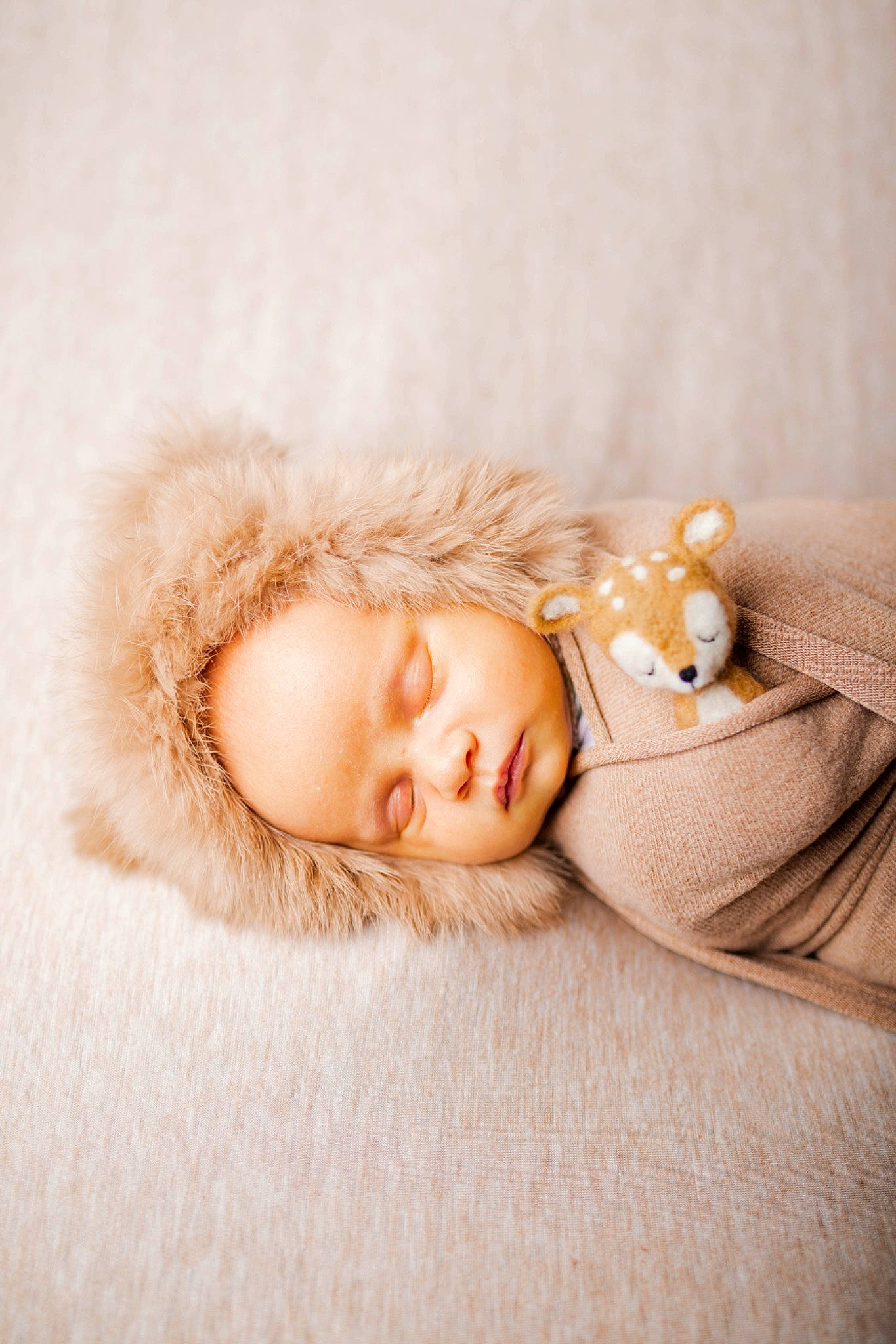 Ares is registered to the contest to win money with this photo: bed, bedding, child, comfort, ear, eye, eyelash, fashion_accessory, fawn, flooring, fur, fur_clothing, hair, head, linens, nap, person, portrait_photography, sleep, sleeve