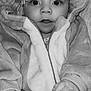baby, bodypart, bonnet, clothing, coat, face, finger, hand, happy, hat, head, hood, hoodie, jacket, knitwear, person, photography, portrait, sweater, sweatshirt