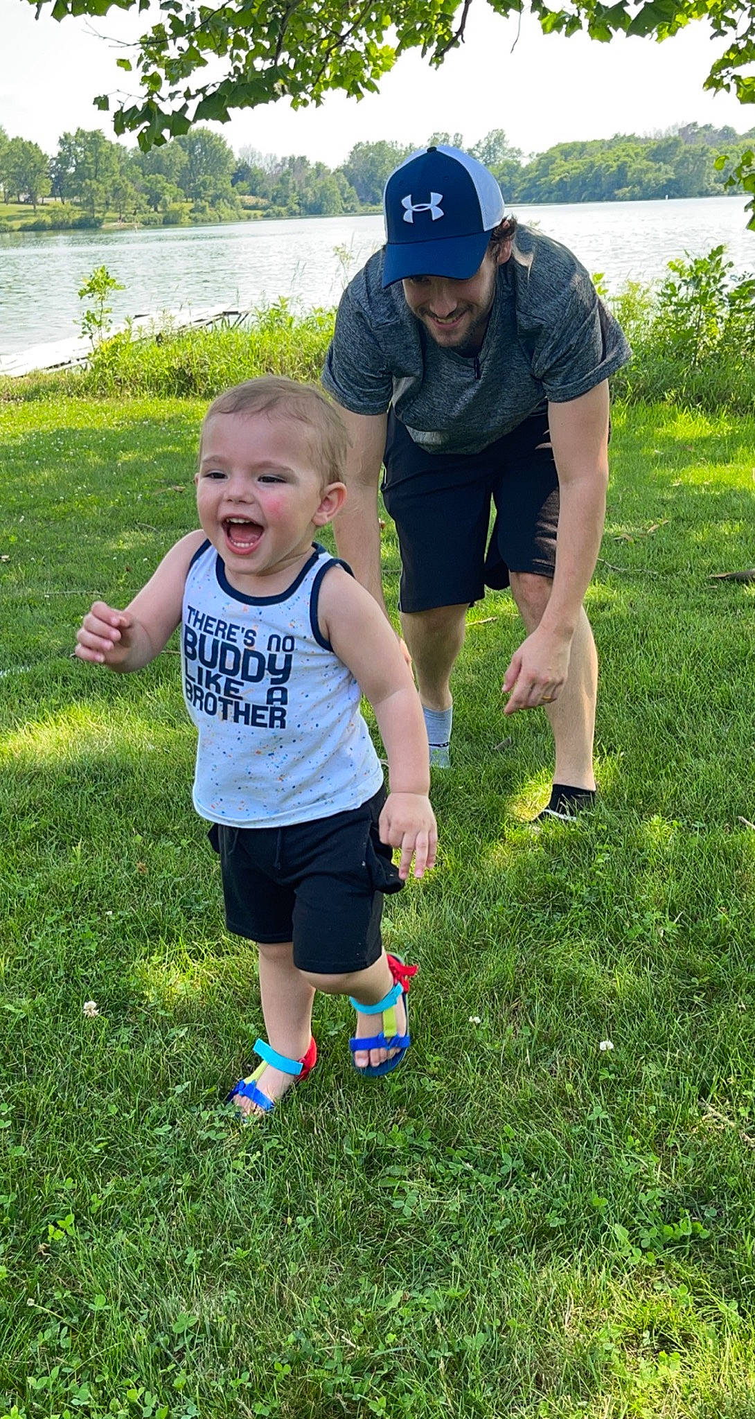 Kaiser joined the competition — help win amazing prizes! baseball_cap, child, fun, gesture, grass, grassland, happy, hat, headwear, joy, lawn, leisure, people_in_nature, person, plant, recreation, shorts, sky, smile, sneakers