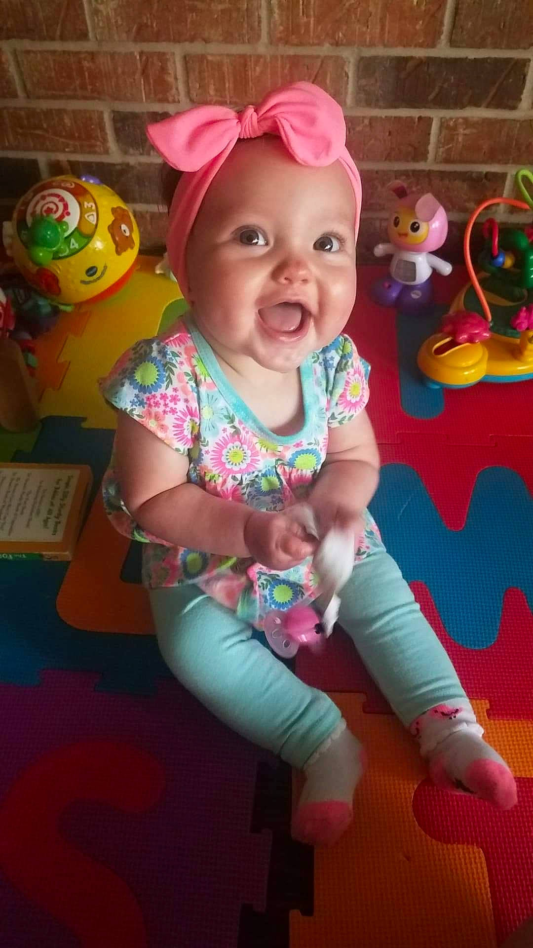 Emarie is registered to the contest to win money with this photo: baby, baby_toys, child, fun, person, pink, play, smile, toddler, toy