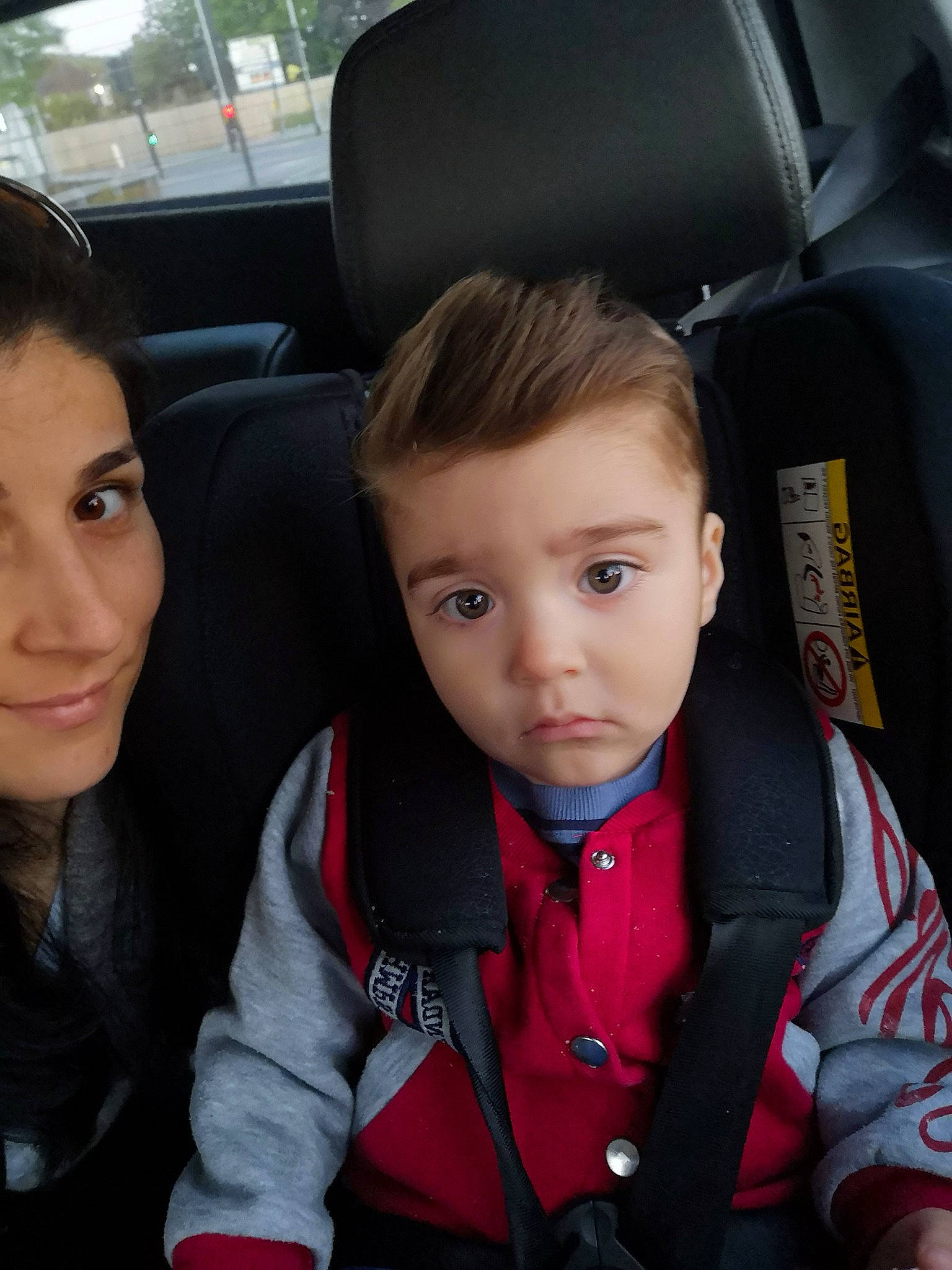 Matei is registered to the contest to win money with this photo: auto_part, automotive_design, car, car_seat, car_seat_cover, cheek, child, comfort, electric_blue, family_car, fun, happy, head_restraint, jacket, luxury_vehicle, motor_vehicle, person, smile, toddler, travel