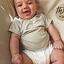 baby, child, smiling, striped_shirt, white_clothing, infant, soft_surface, milestone_marker, skin, cute, happy, furniture, portrait, one_person, young_child, sitting, indoors, chubby, baby_girl, baby_boy