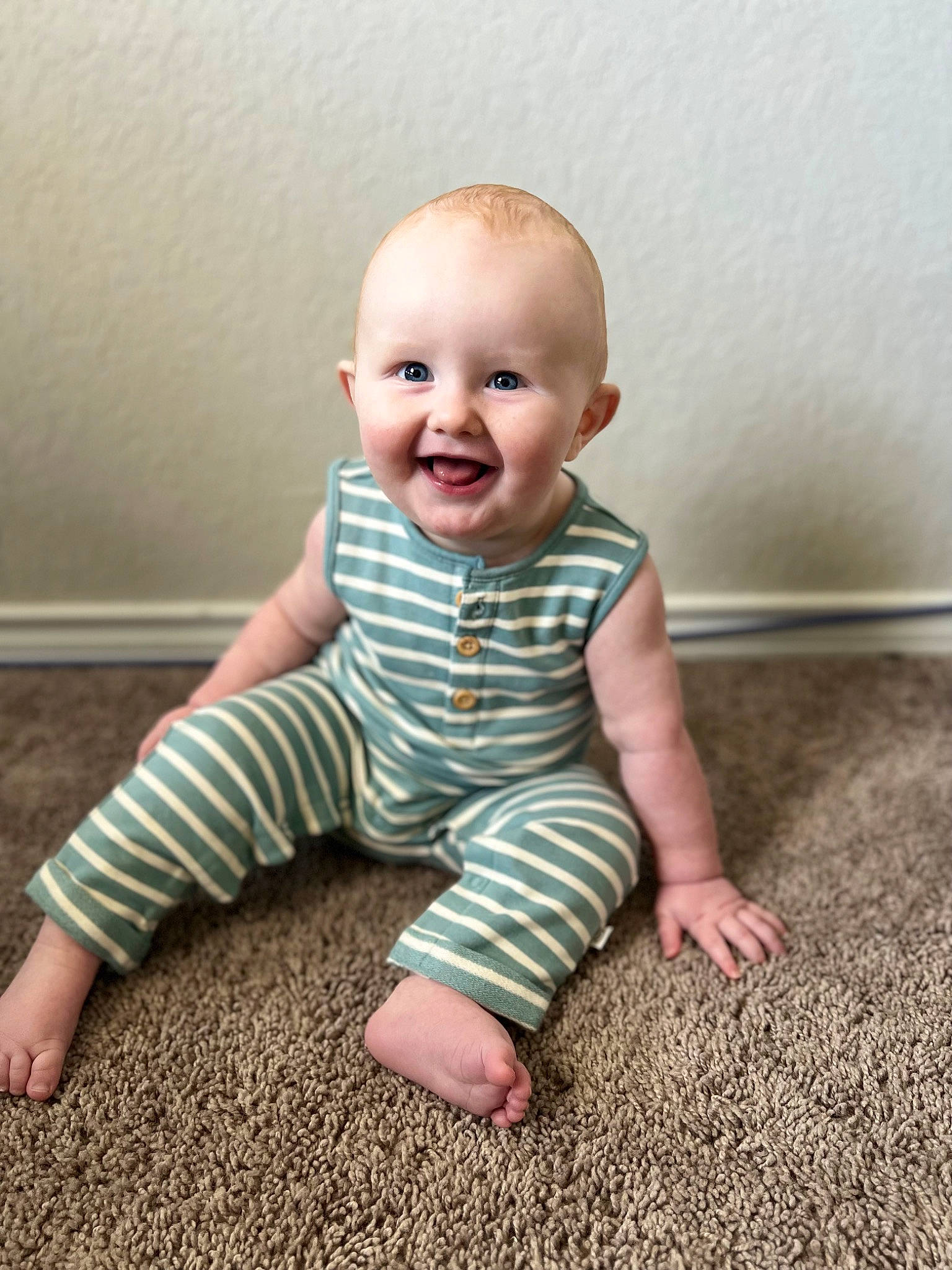 Alaric joined the competition — help win amazing prizes! baby, baby_toddler_clothing, cheek, comfort, eye, flash_photography, floor, flooring, foot, grey, happy, human_leg, iris, joy, pattern, person, sitting, skin, sleeve, smile