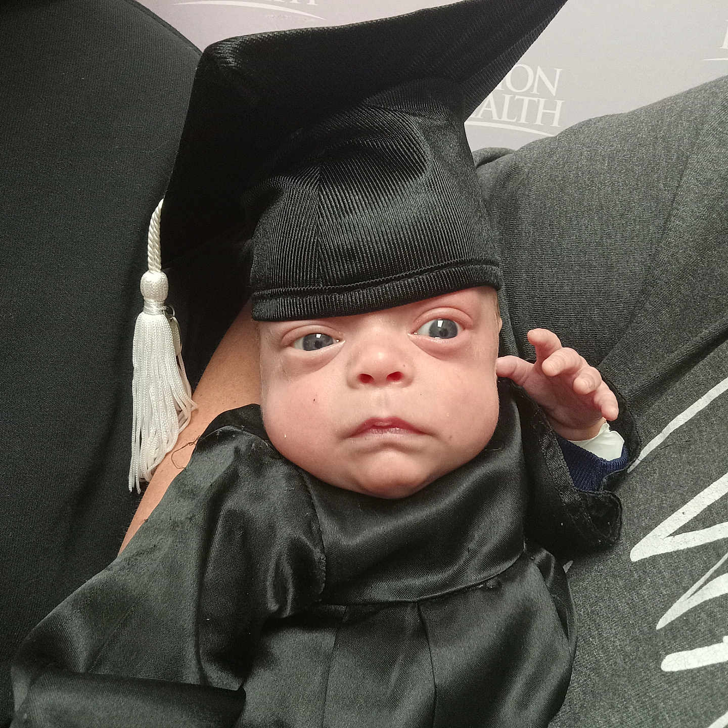 Archer joined the competition — help win amazing prizes! baby, bodypart, bonnet, cap, clothing, dress, face, fashion, finger, fleece, graduation, hand, hat, head, hood, people, person, photography, portrait, text