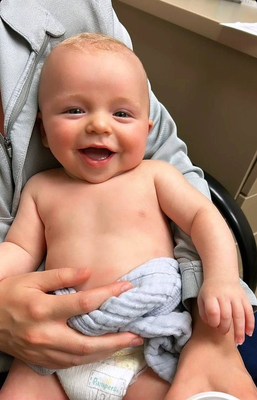 Brooks joined the competition — help win amazing prizes! baby, cheek, eye, face, facial_expression, finger, gesture, hand, happy, head, joint, joy, mouth, muscle, organ, person, product, shoulder, skin, smile