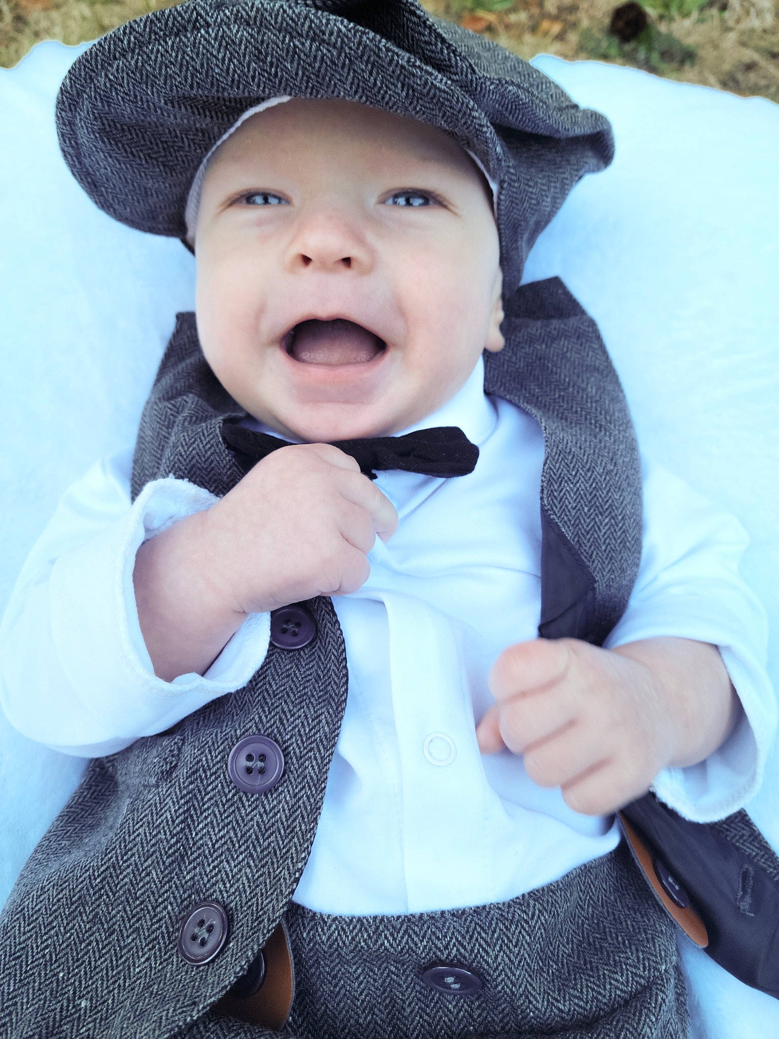 Deklan is registered to the contest to win money with this photo: baby, baby_toddler_clothing, bow_tie, cap, child, collar, dress_shirt, happy, hat, headgear, headwear, lip, outerwear, pattern, person, skin, sleeve, smile, sun_hat, toddler