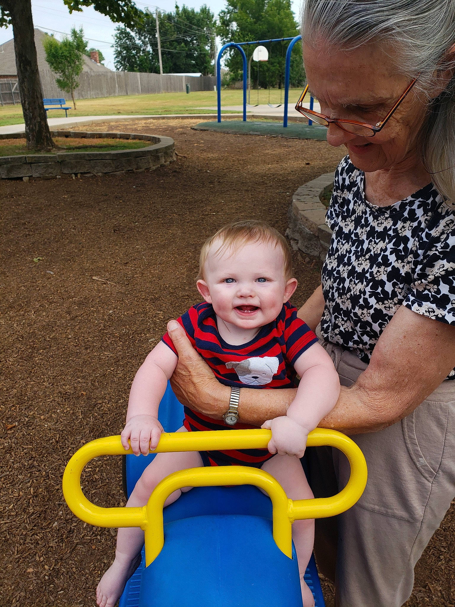 Thomas is registered to the contest to win money with this photo: baby, baby_products, child, fun, human_settlement, leisure, outdoor_play_equipment, person, play, playground, product, public_space, recreation, sitting, skin, smile, summer, toddler, vacation