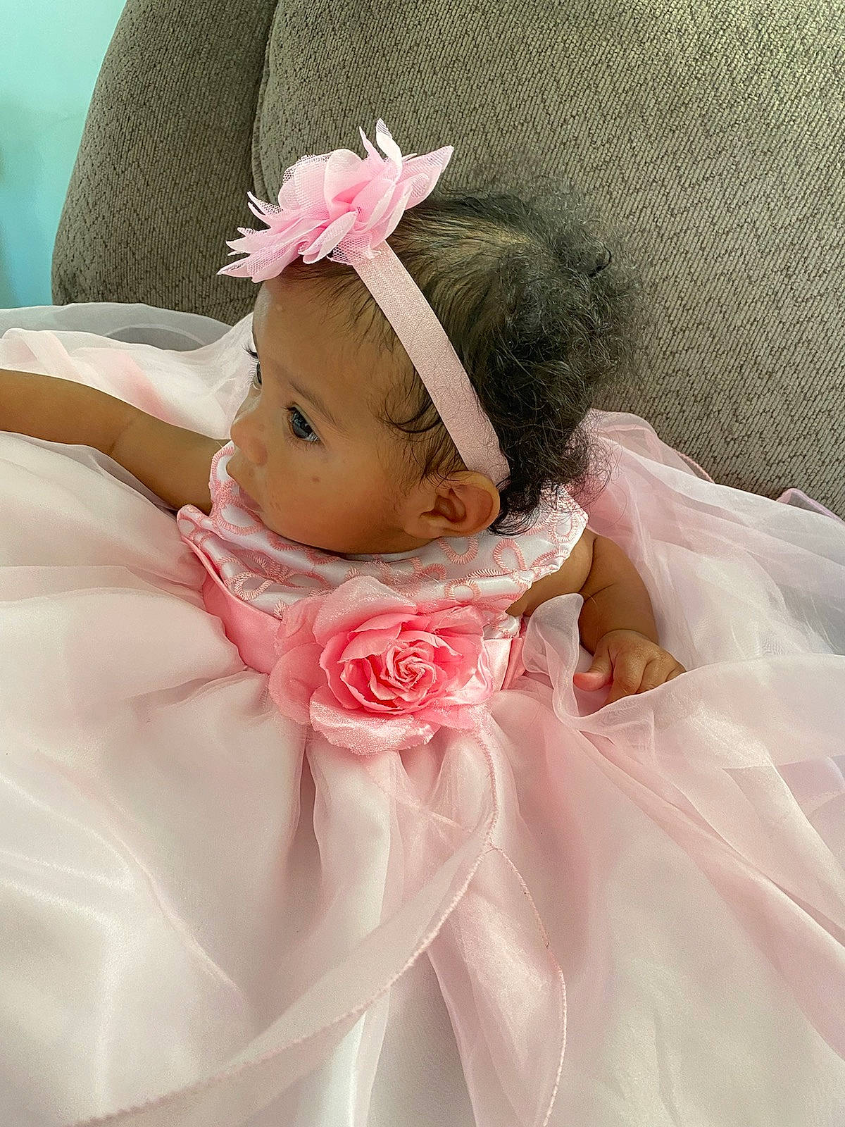 Lila joined the competition — help win amazing prizes! baby_toddler_clothing, bridal_accessory, costume_hat, dress, embellishment, eye, eyelash, flower, hair_accessory, happy, head, headband, headgear, headpiece, person, petal, picture_frame, pink, textile, toy