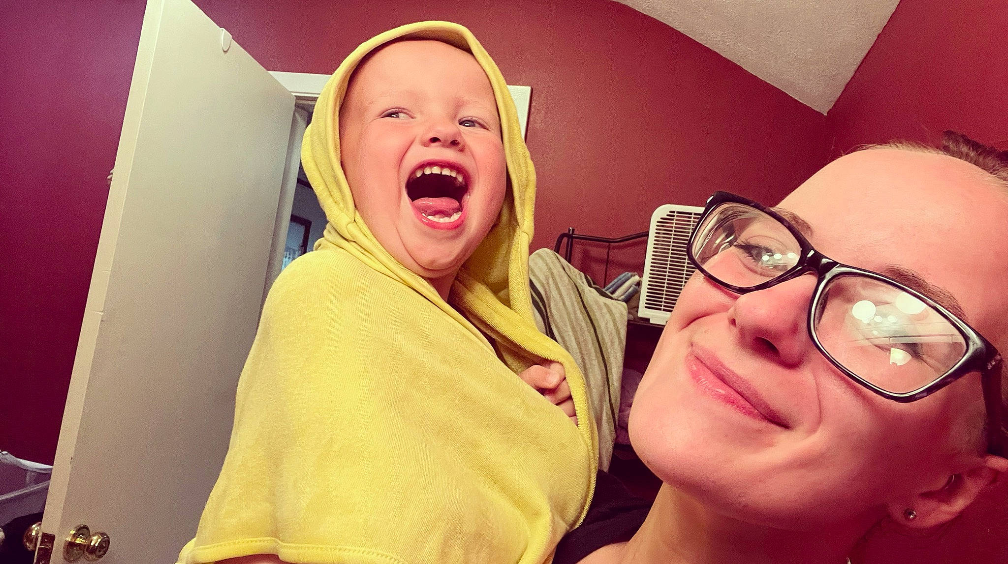 Ashton is registered to the contest to win money with this photo: baby, child, comfort, eyelash, eyewear, finger, fun, gesture, glasses, happy, jaw, leisure, lip, mouth, nose, person, shout, skin, smile, tooth