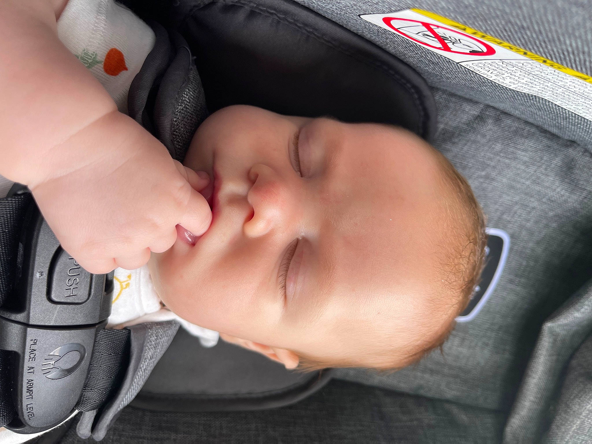 Myles is registered to the contest to win money with this photo: baby, baby_carriage, baby_toddler_clothing, cheek, chin, comfort, eye, eyebrow, eyelash, finger, gesture, hand, head, iris, lip, mouth, neck, nose, person, skin