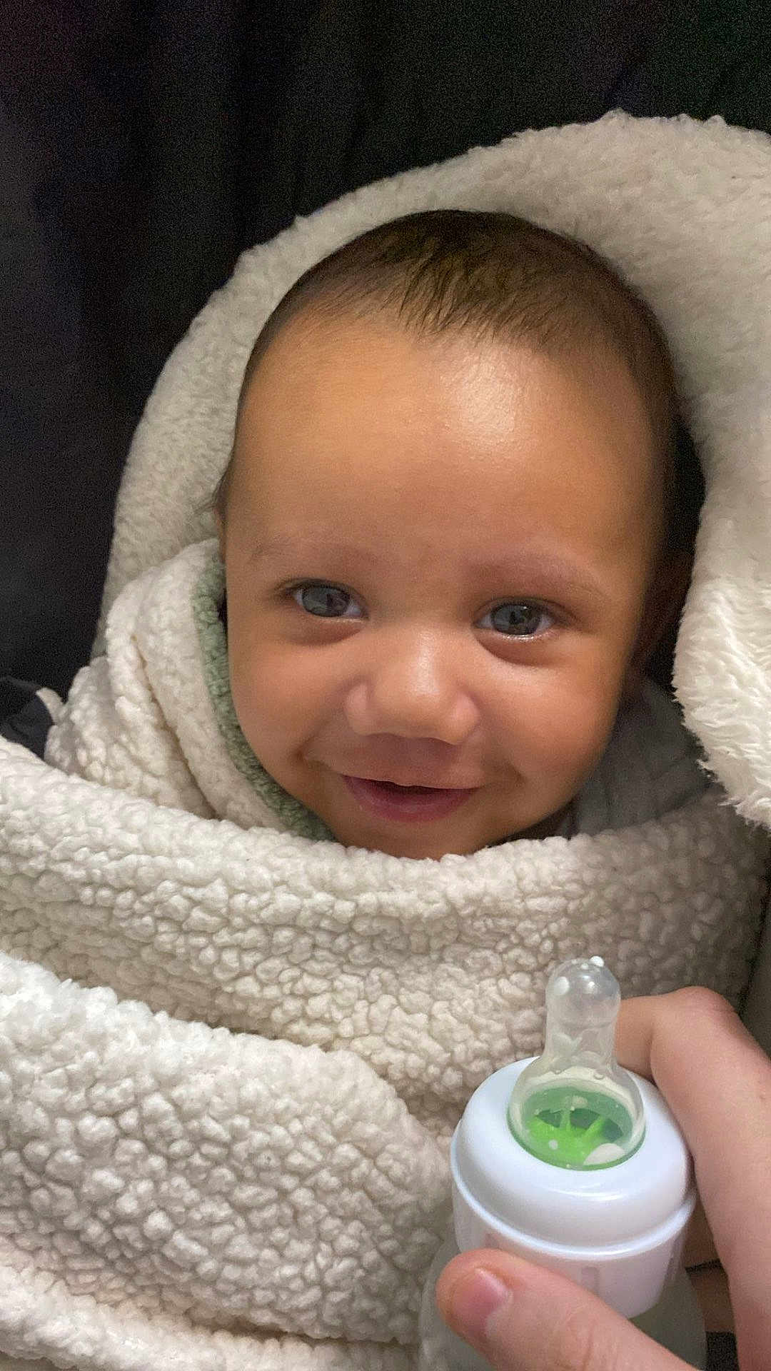 Terrell joined the competition — help win amazing prizes! baby, smiling, blanket, bottle, hand, wrapped, infant, cute, face, child, feeding, cozy, warm, portrait, closeup, happy, person, indoors, soft, newborn