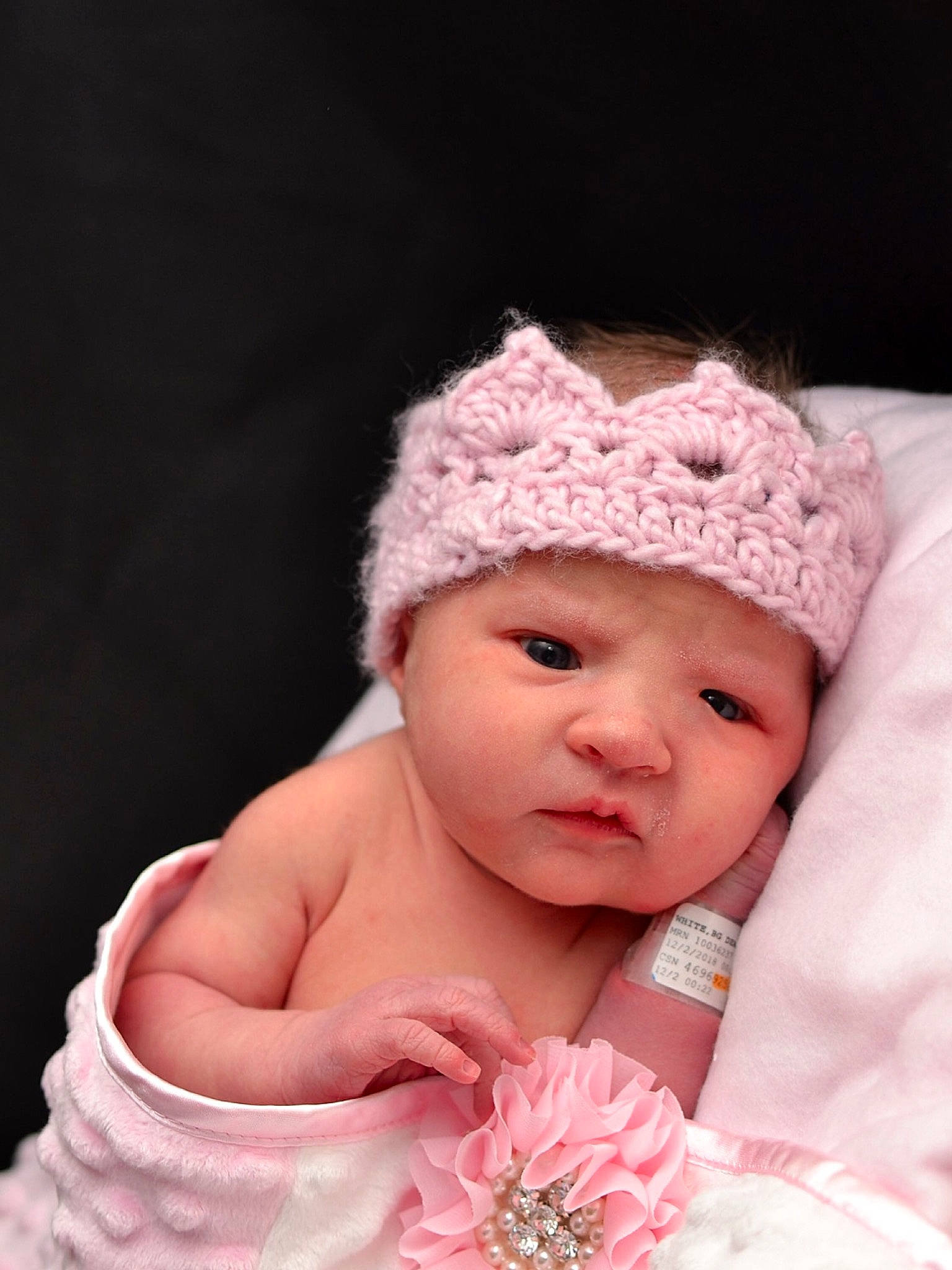 Isabelle Nichole is registered to the contest to win money with this photo: baby, beanie, bonnet, cheek, child, clothing, costume_accessory, crochet, fashion_accessory, hair_accessory, hat, headgear, headpiece, headwear, knit_cap, person, photograph, photography, pink, skin
