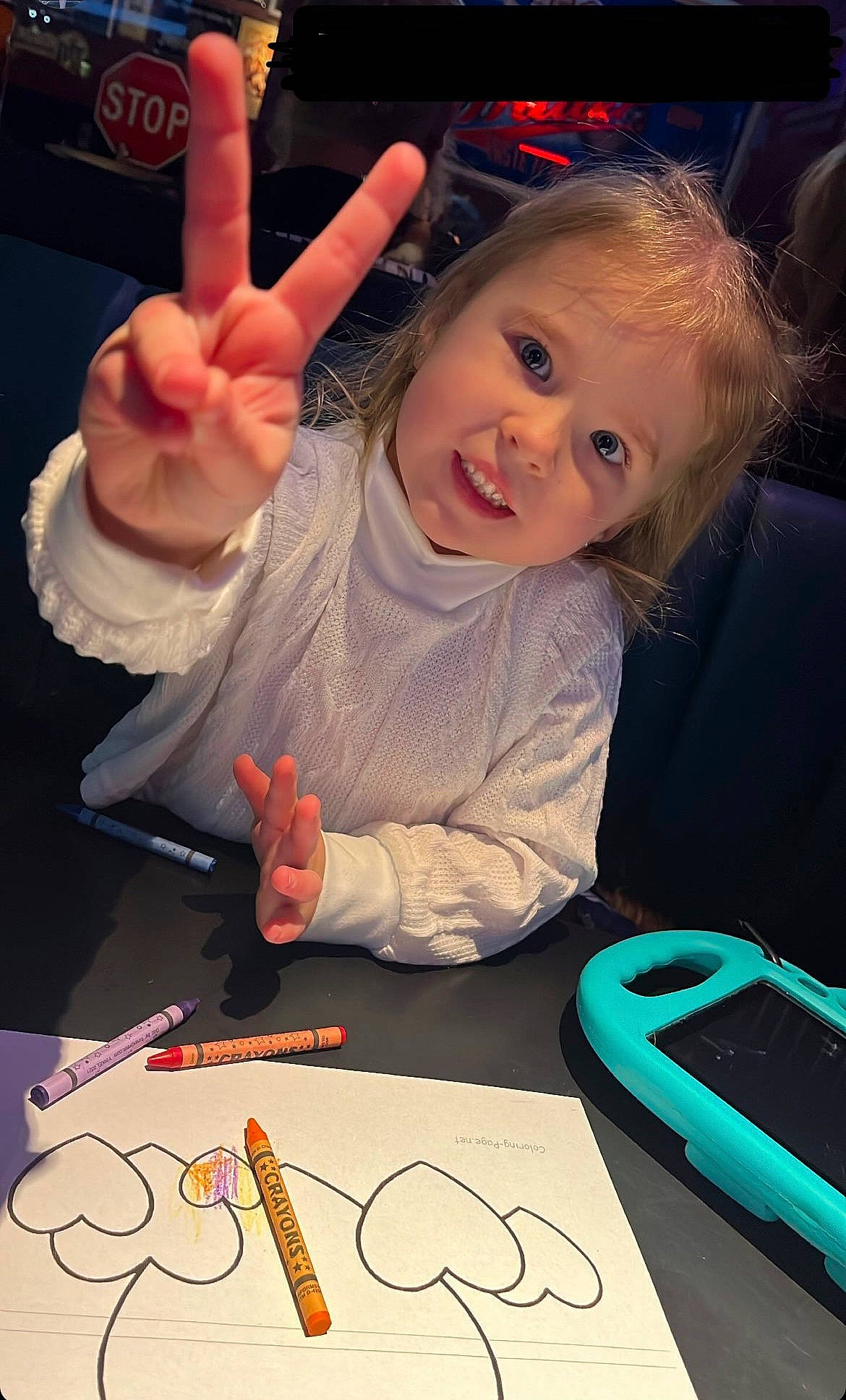 Isabelle is registered to the contest to win money with this photo: art, child, finger, fun, gesture, hand, happy, light, nail, organ, paint, person, sharing, smile, snapshot, space, t_shirt, table, thumb, toddler