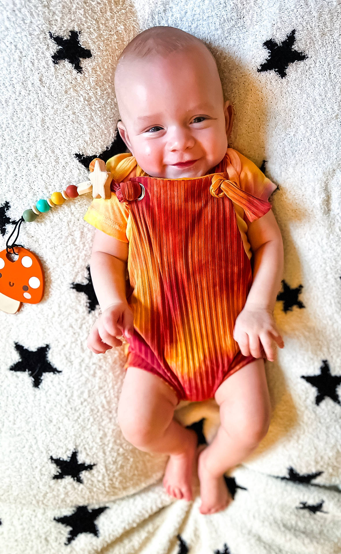Cassian joined the competition — help win amazing prizes! applique, baby, bodypart, clothing, cushion, dress, face, finger, hand, happy, head, homedecor, newborn, pattern, person, photography, portrait, sitting, smile, toy