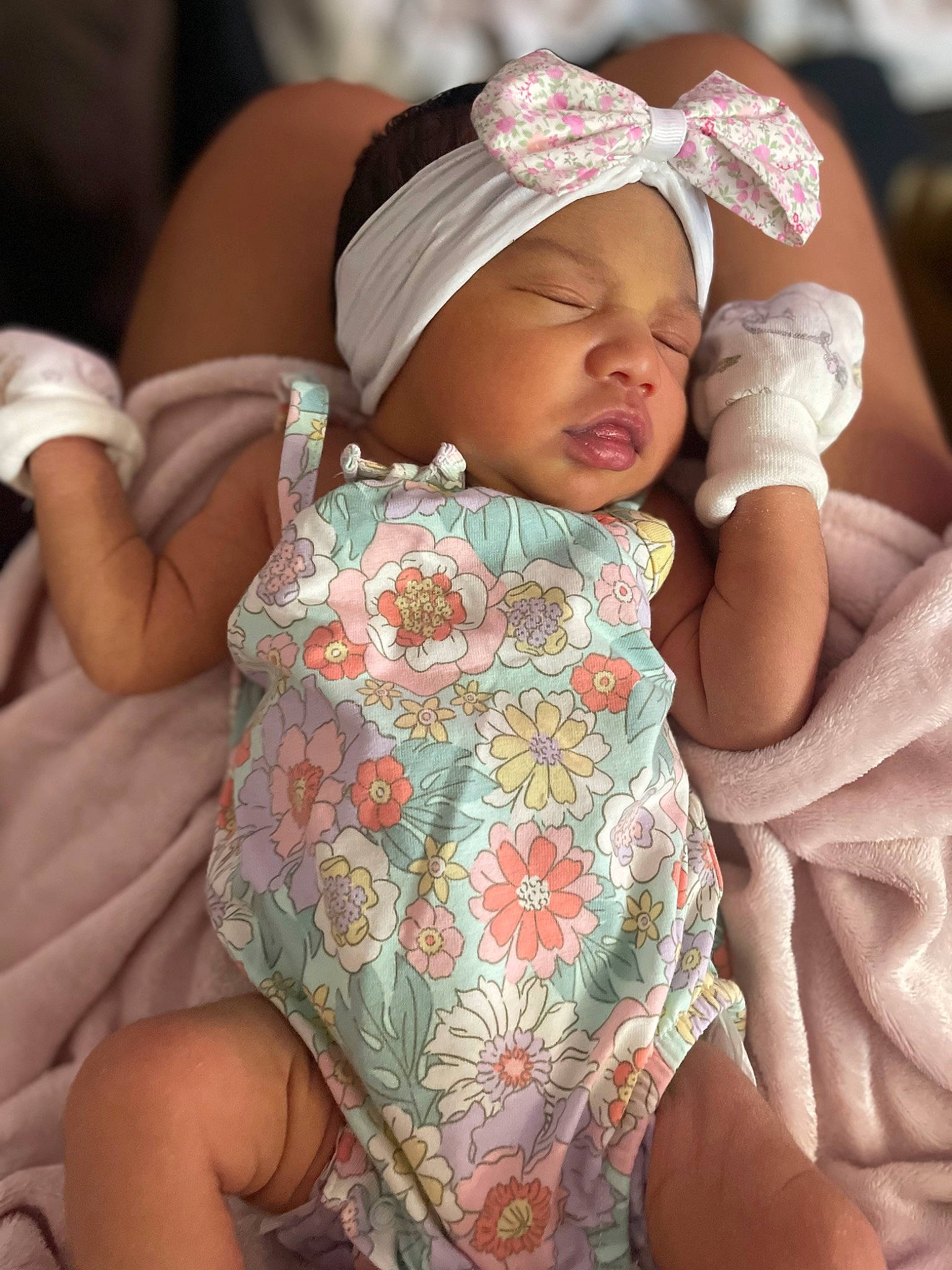 Alira is registered to the contest to win money with this photo: baby, baby_toddler_clothing, cheek, chest, child, chin, comfort, event, eyelash, face, finger, happy, head, headwear, mouth, neck, pattern, person, pink, skin