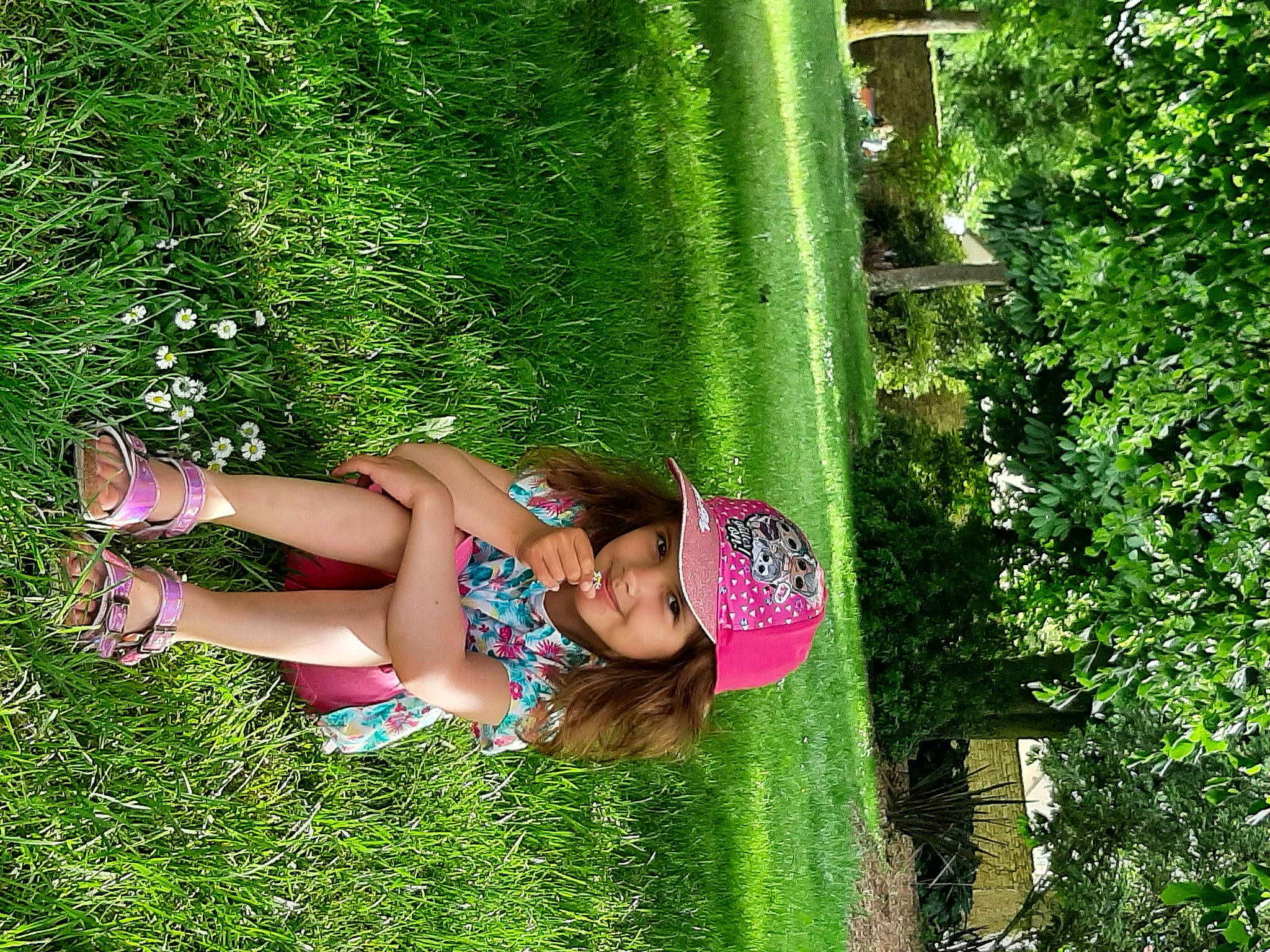 Iliana a rejoint le concours — aidez-le/la à gagner de superbes lots ! fun, garden, grass, grass_family, green, happy, headwear, human_leg, joy, knee, leisure, magenta, people_in_nature, person, plant, recreation, shrub, smile, terrestrial_plant, thigh
