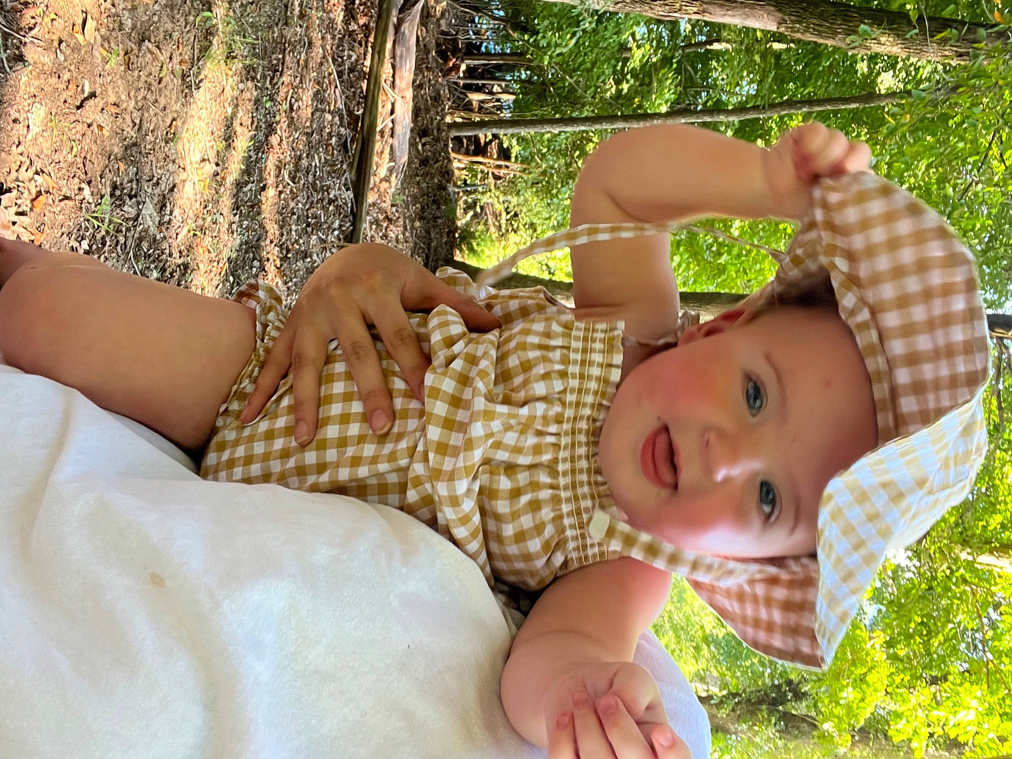 Sadie joined the competition — help win amazing prizes! adaptation, arm, baby, baby_toddler_clothing, comfort, finger, fun, grass, hand, happy, hat, headwear, human_leg, leisure, pattern, people_in_nature, person, plant, thigh, toddler