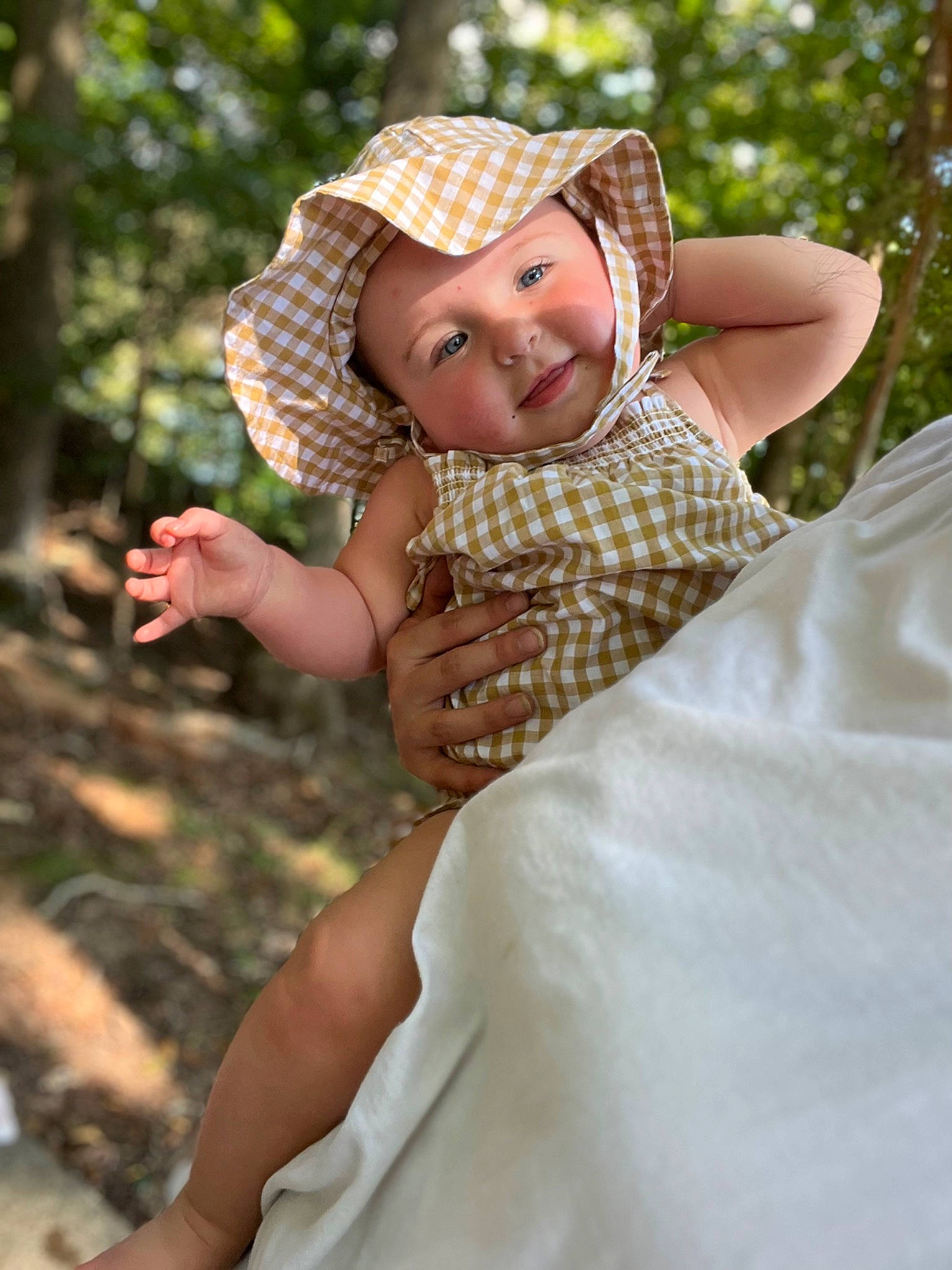 Sadie joined the competition — help win amazing prizes! baby, cap, eye, fashion_accessory, fun, gesture, grass, happy, hat, headgear, headwear, leisure, pattern, people_in_nature, person, photograph, plant, sleeve, smile, sun_hat