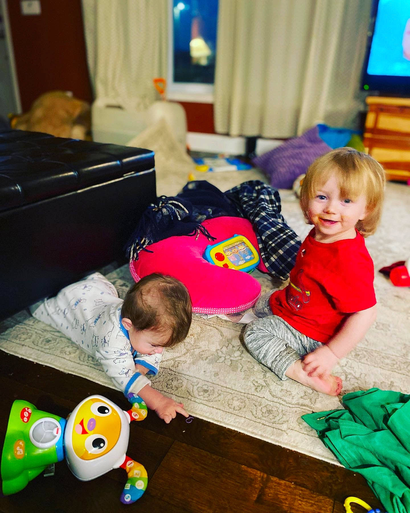 Robert joined the competition — help win amazing prizes! baby, baby_playing_with_toys, baby_products, baby_toddler_clothing, baby_toys, child, curtain, human, interior_design, joy, living_room, person, picture_frame, play, playing_with_kids, room, sock, toddler, toy, window_covering