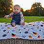 Hunter Jr joined the competition — help win amazing prizes! baby, child, barefoot, blanket, halloween_pattern, hay_bale, outdoor, field, sunset, greenery, nature, autumn, cute, infant, overalls, long_sleeve_shirt, grass, daylight, portrait, sitting