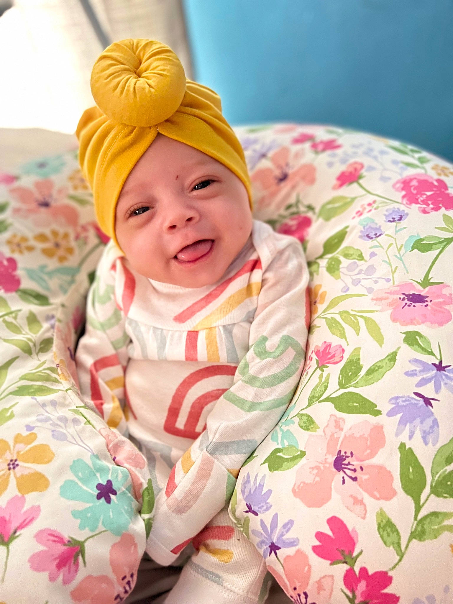 Loyalty is registered to the contest to win money with this photo: baby, baby_products, baby_toddler_clothing, cap, cheek, child, comfort, face, facial_expression, happy, headwear, linens, outerwear, pattern, people, person, pink, product, skin, sleeve