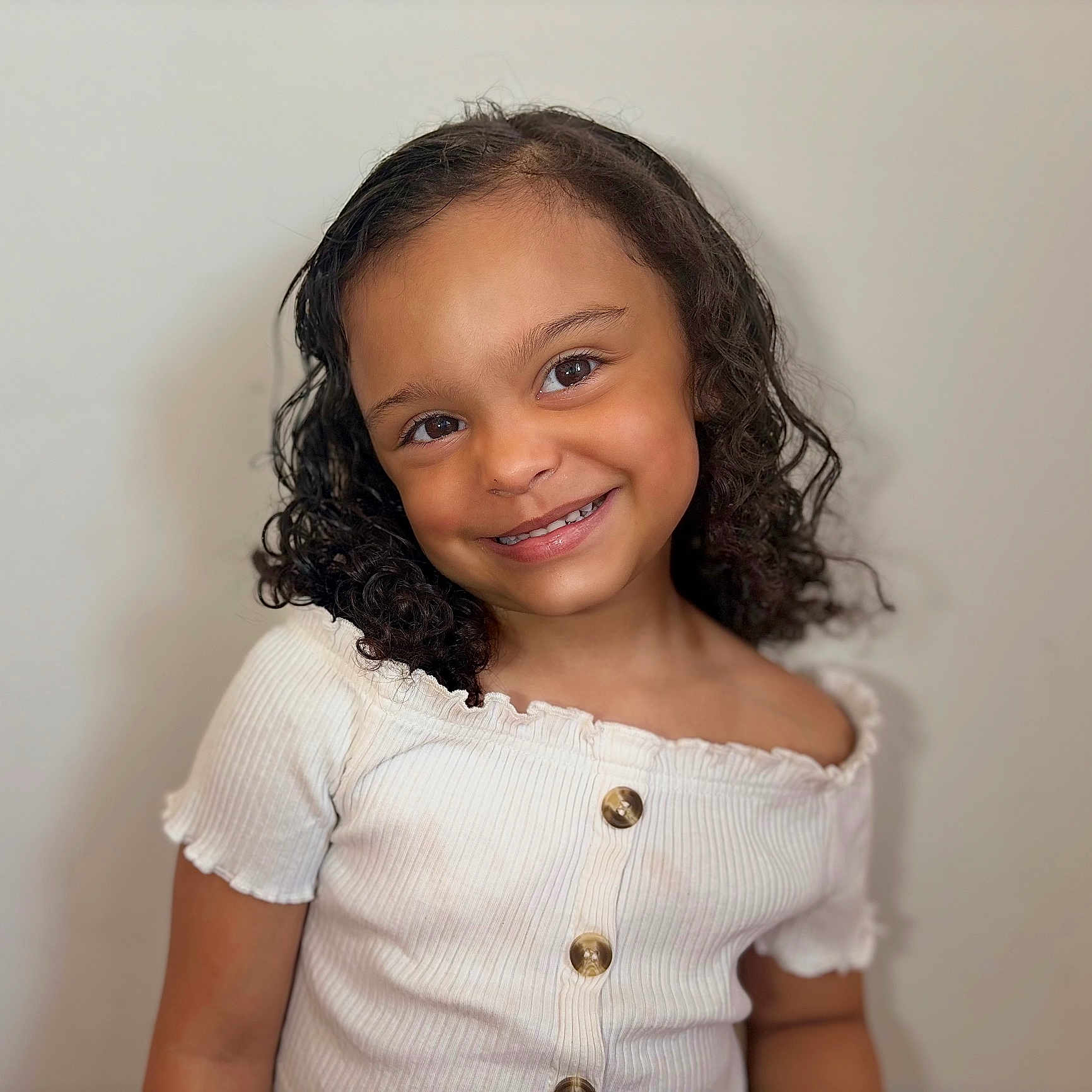 Brooklyn is registered to the contest to win money with this photo: blackhair, blouse, bodypart, child, clothing, dimples, dress, face, female, girl, hair, happy, head, neck, person, photography, portrait, shoulder, sleeve, smile