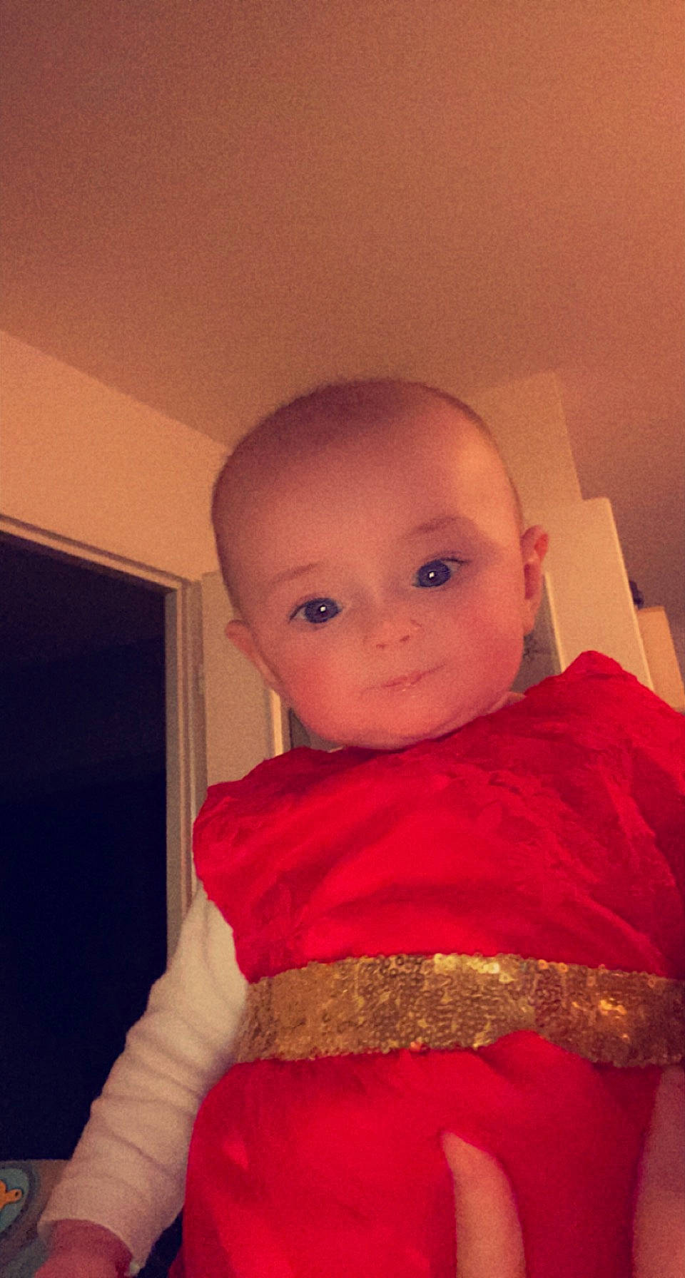 Inaya participe au concours pour gagner de l'argent avec cette photo : baby, baby_toddler_clothing, cheek, child, comfort, eyebrow, eyelash, fashion_design, formal_wear, fun, happy, iris, lip, magenta, neck, nose, person, sitting, skin, sleeve