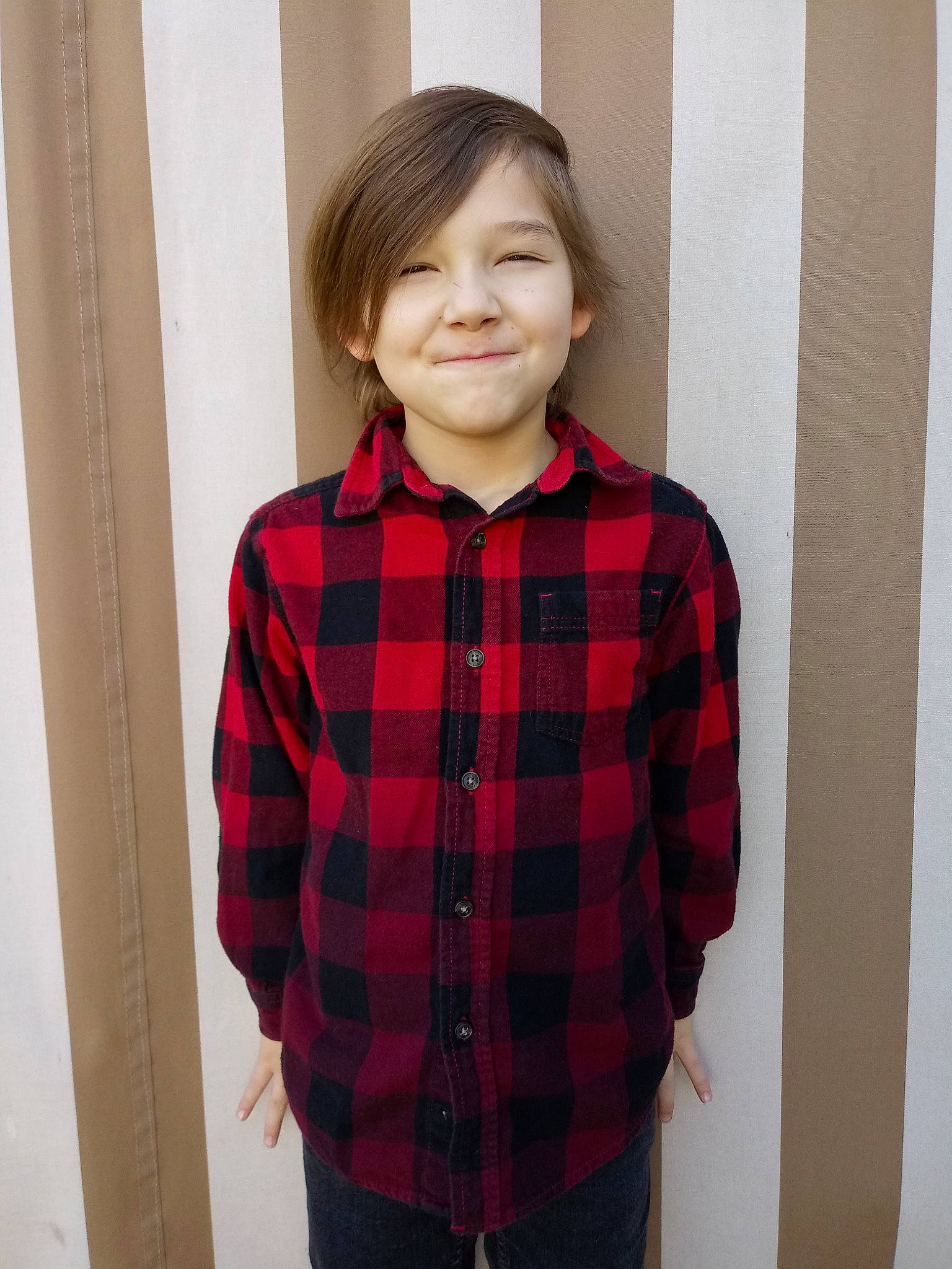 Blayne Kai is registered to the contest to win money with this photo: child, child_model, clothing, design, jacket, joy, outerwear, pattern, person, plaid, shirt, sleeve, smile, tartan, textile, toddler, top