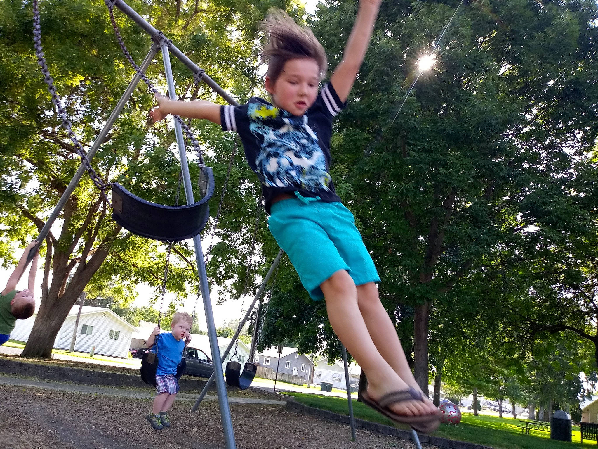 Blayne Kai joined the competition — help win amazing prizes! child, city, fun, happy, jumping, leisure, outdoor_play_equipment, person, plant, play, playground, public_space, recreation, rope, swing, trampoline, trampolining_equipment_and_supplies, tree, vacation