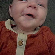 Remington joined the competition — help win amazing prizes! baby, smiling, face, child, infant, clothing, red_shirt, button, portrait, cute, young, head, person, indoor, happy, expression, skin, eyes, mouth, closeup