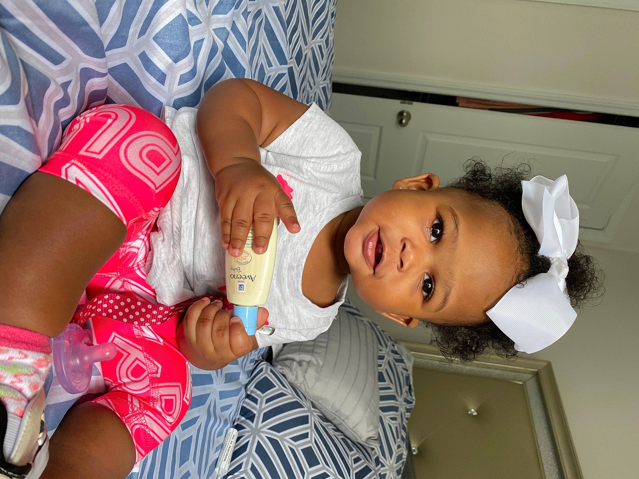 Ania is registered to the contest to win money with this photo: baby, child, person, toddler