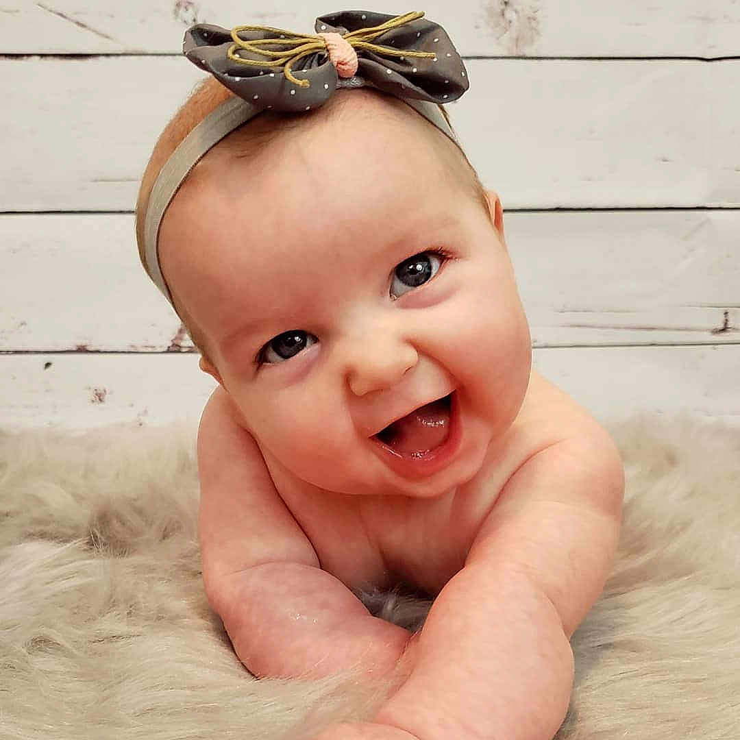 Ridley is registered to the contest to win money with this photo: baby, baby_making_funny_faces, cheek, child, chin, ear, eye, face, facial_expression, forehead, hand, head, lip, mouth, nose, organ, person, photography, skin, smile