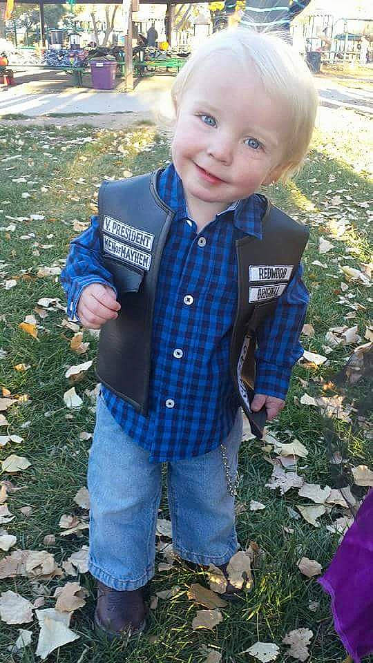 Ryland is registered to the contest to win money with this photo: child, jacket, joy, leaf, male, outerwear, person, smile, t_shirt, toddler