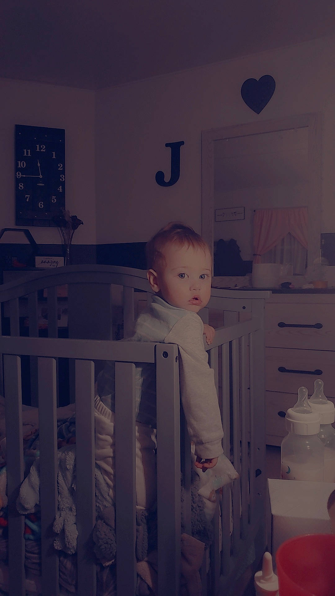 Jayce is registered to the contest to win money with this photo: baby, baby_products, baby_safety, baby_toddler_clothing, black, child, cradle, happy, home, infant_bed, lighting_accessory, monochrome, monochrome_photography, nursery, person, product, room, sitting, standing, toddler