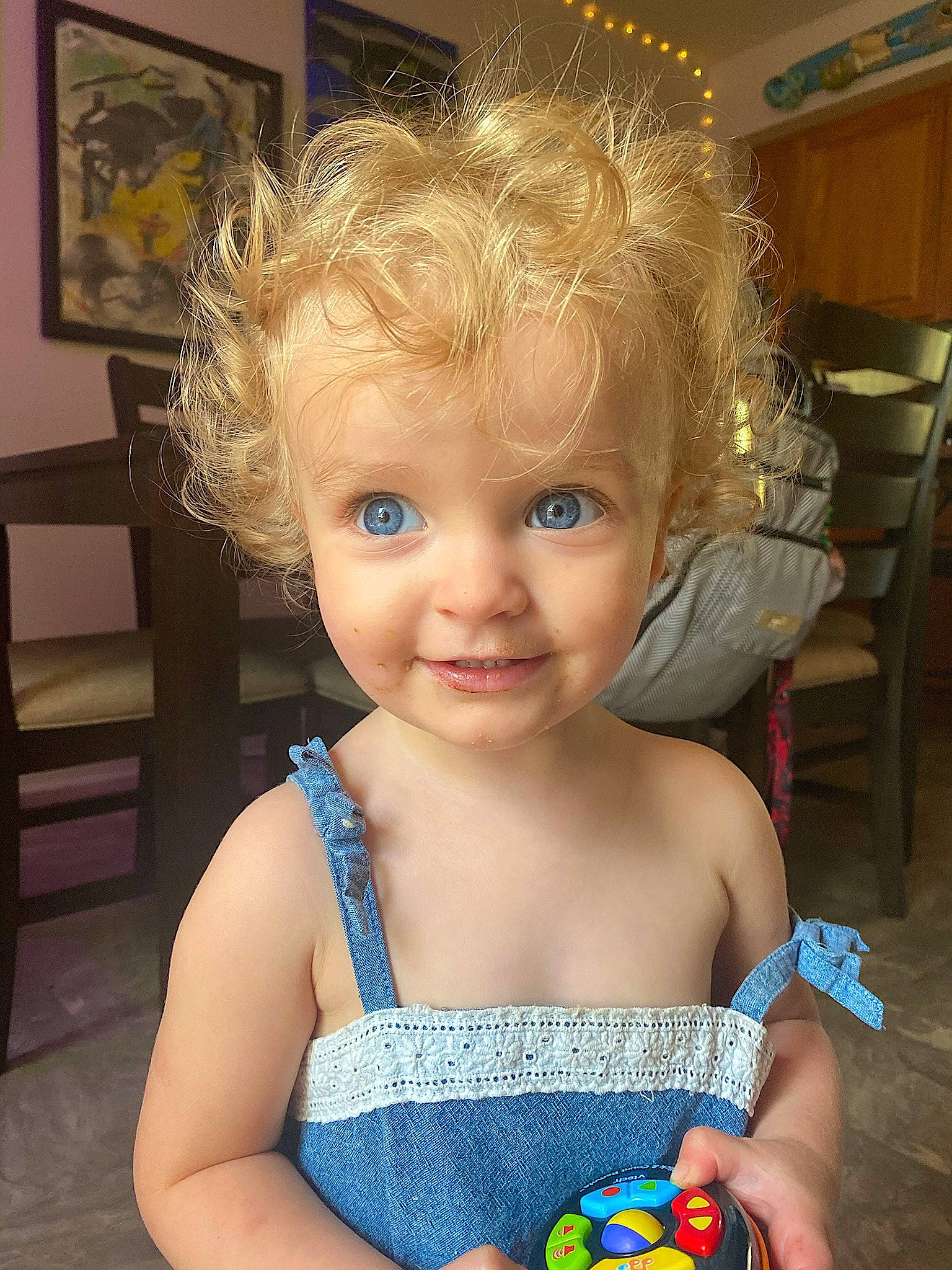Eva joined the competition — help win amazing prizes! baby, baby_toddler_clothing, beauty, blond, chair, cheek, chest, child, electric_blue, eye, flooring, fun, hairstyle, happy, iris, person, picture_frame, sitting, skin, smile