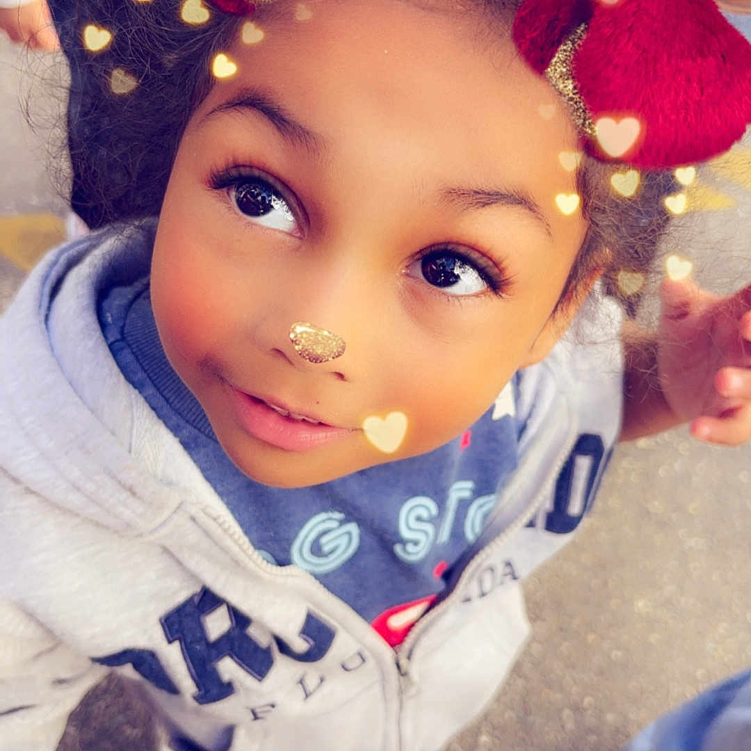 Erika joined the competition — help win amazing prizes! accessories, baby, bodypart, cap, clothing, dress, face, finger, footwear, hand, hat, head, knitwear, pants, person, photography, portrait, shoe, sneaker, sweater