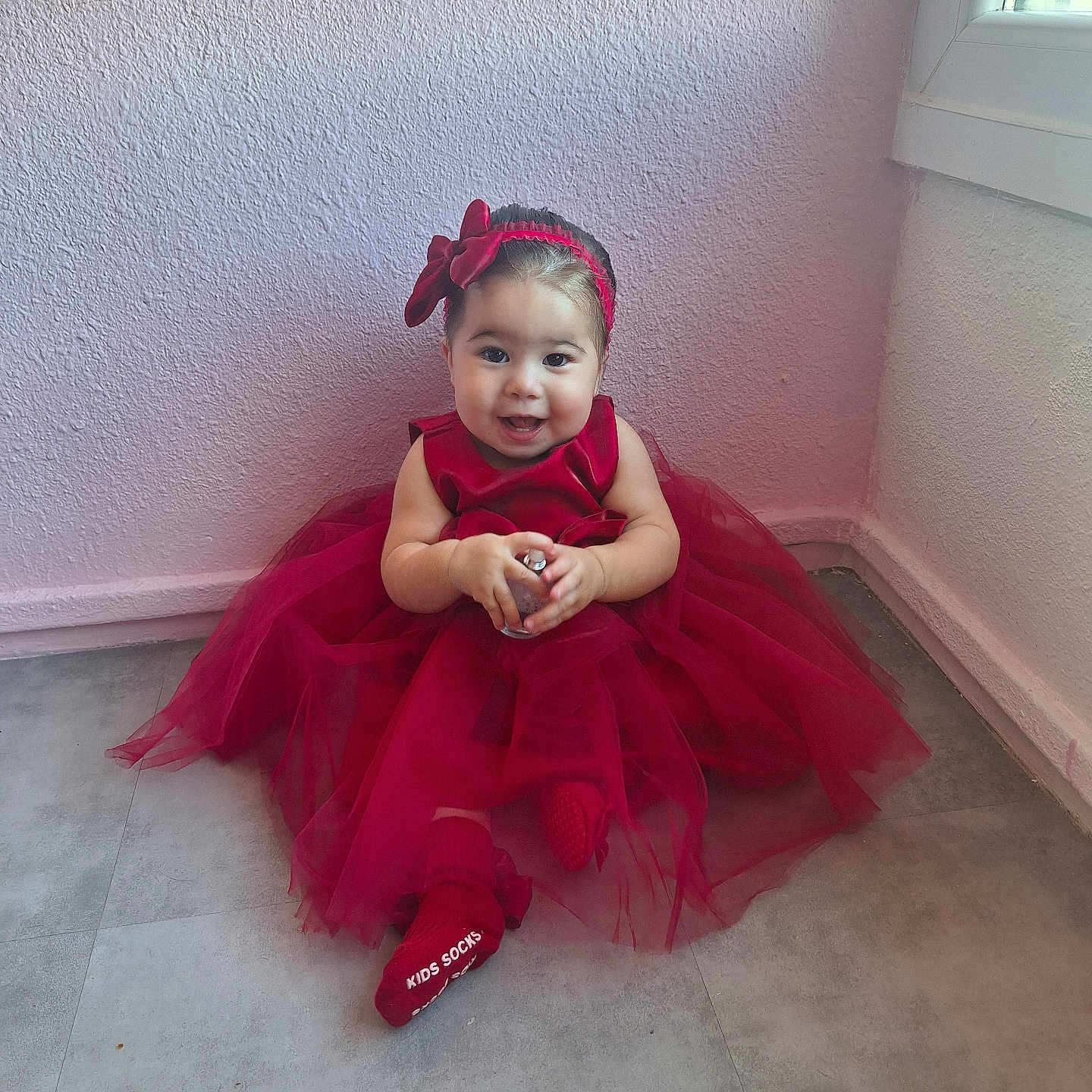 Catalina participe au concours pour gagner de l'argent avec cette photo : baby, bodypart, clothing, costume, dress, eveningdress, face, fashion, finger, footwear, formalwear, gown, hand, head, person, photography, portrait, shoe, sitting, wood