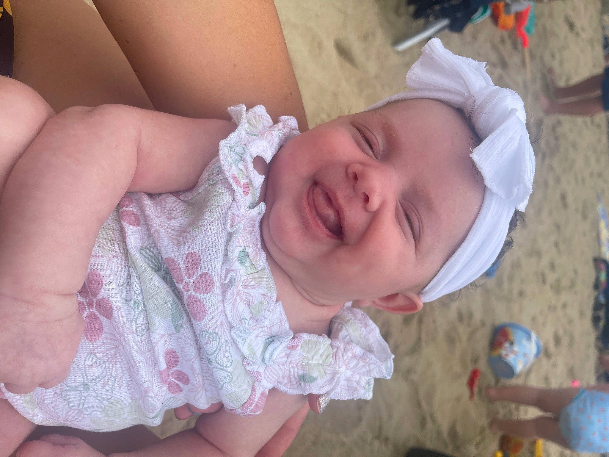 Marley is registered to the contest to win money with this photo: baby, cheek, chin, eye, eyebrow, face, facial_expression, hairstyle, happy, head, headwear, human, human_body, iris, joy, lip, mouth, neck, nose, person