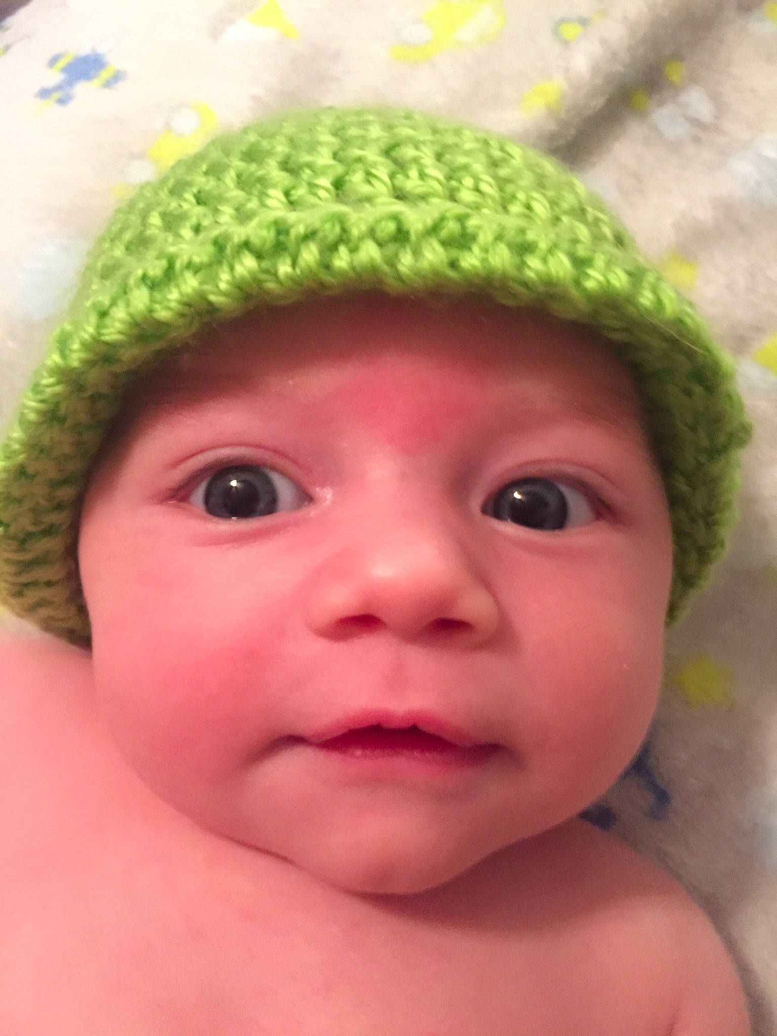 River is registered to the contest to win money with this photo: baby, beanie, bonnet, cap, cheek, child, face, hat, head, headgear, headwear, knit_cap, lip, nose, person, skin, smile, toddler