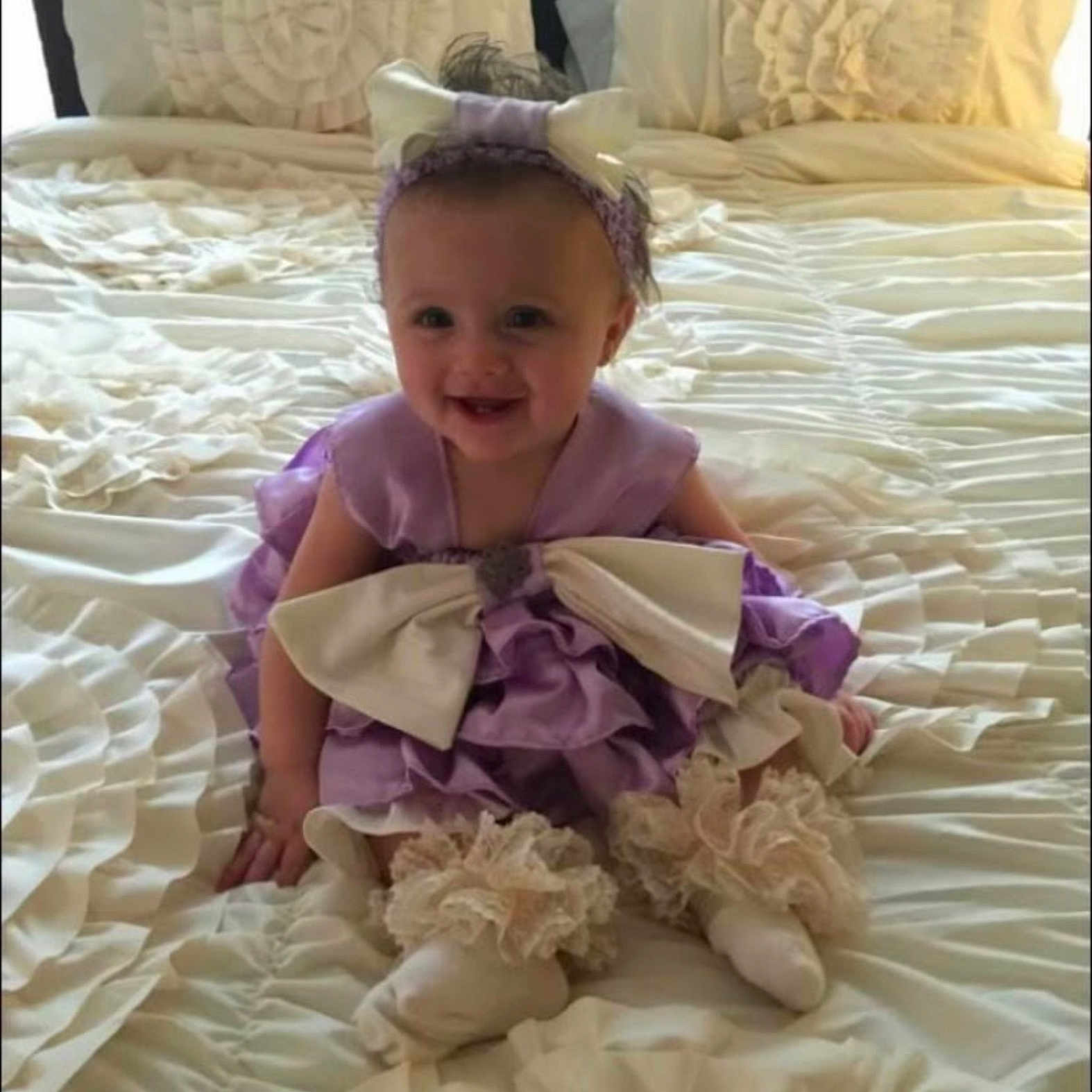 Tina is registered to the contest to win money with this photo: baby, babylaughing, bed, face, furniture, happy, head, laughing, person, smile