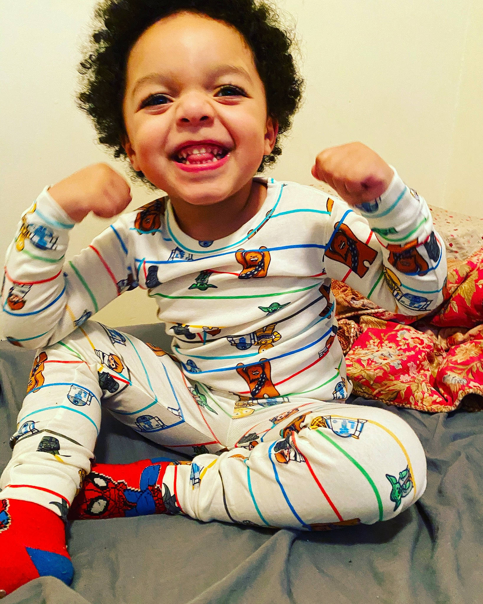 Victor is registered to the contest to win money with this photo: arm, baby, cheek, child, facial_expression, happy, joy, knee, laugh, leg, person, personal_protective_equipment, play, shoe, sitting, sleeve, smile, toddler